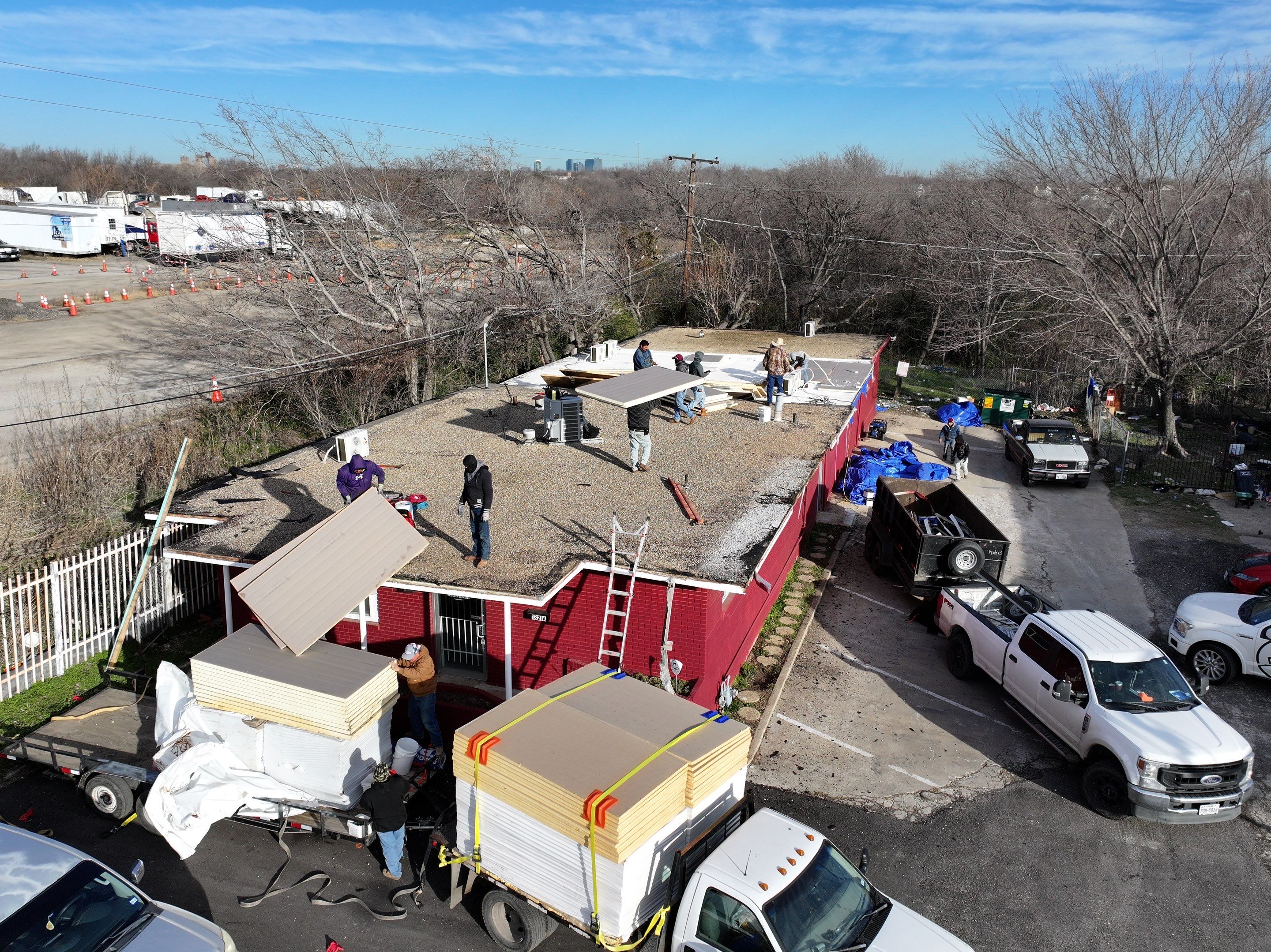 Commercial roofing overlay using GAF TPO over an old ballast roof by Becker Roofing and Exteriors