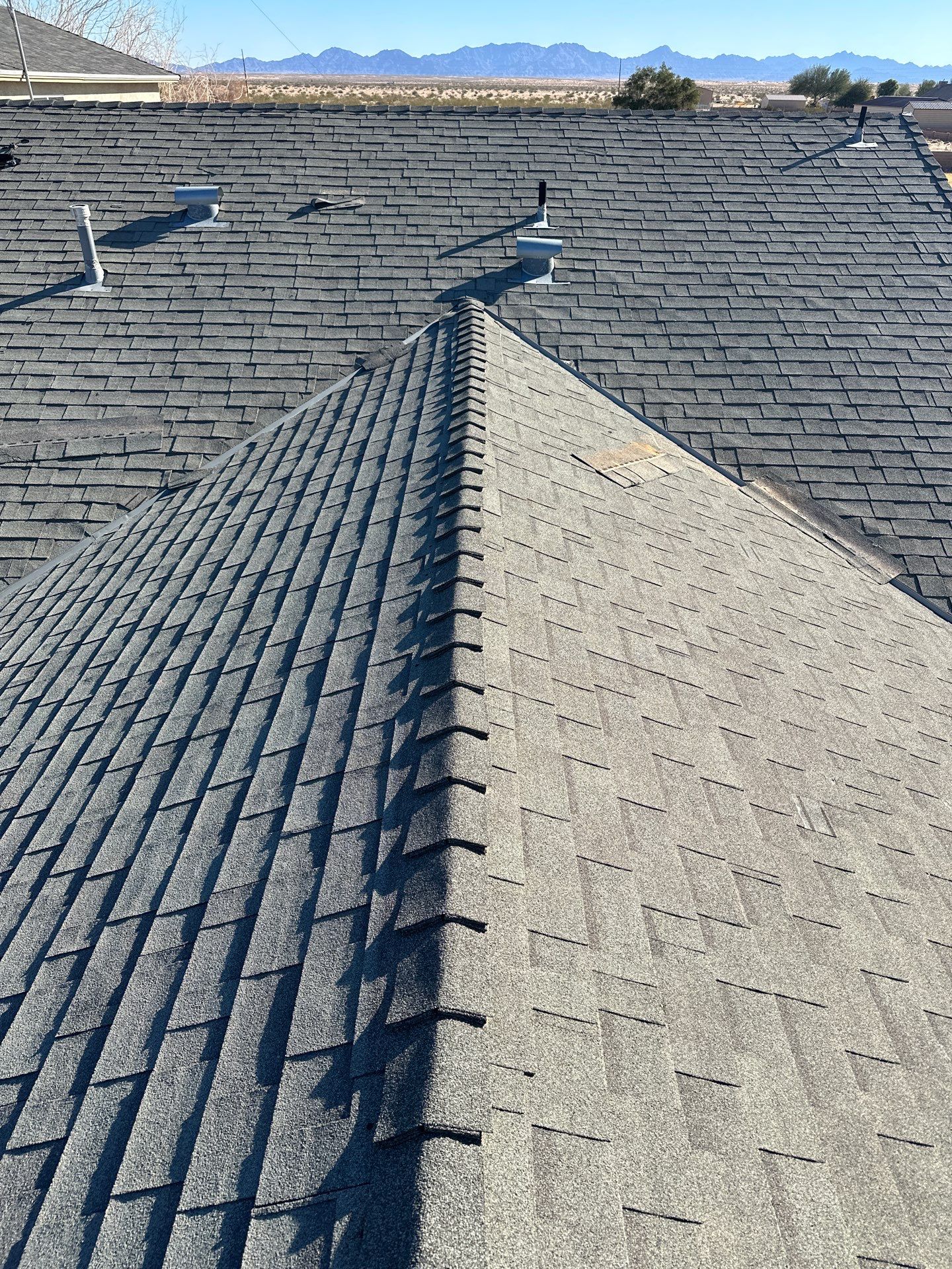 Storm Grey Shingles by Reimagine Roofing