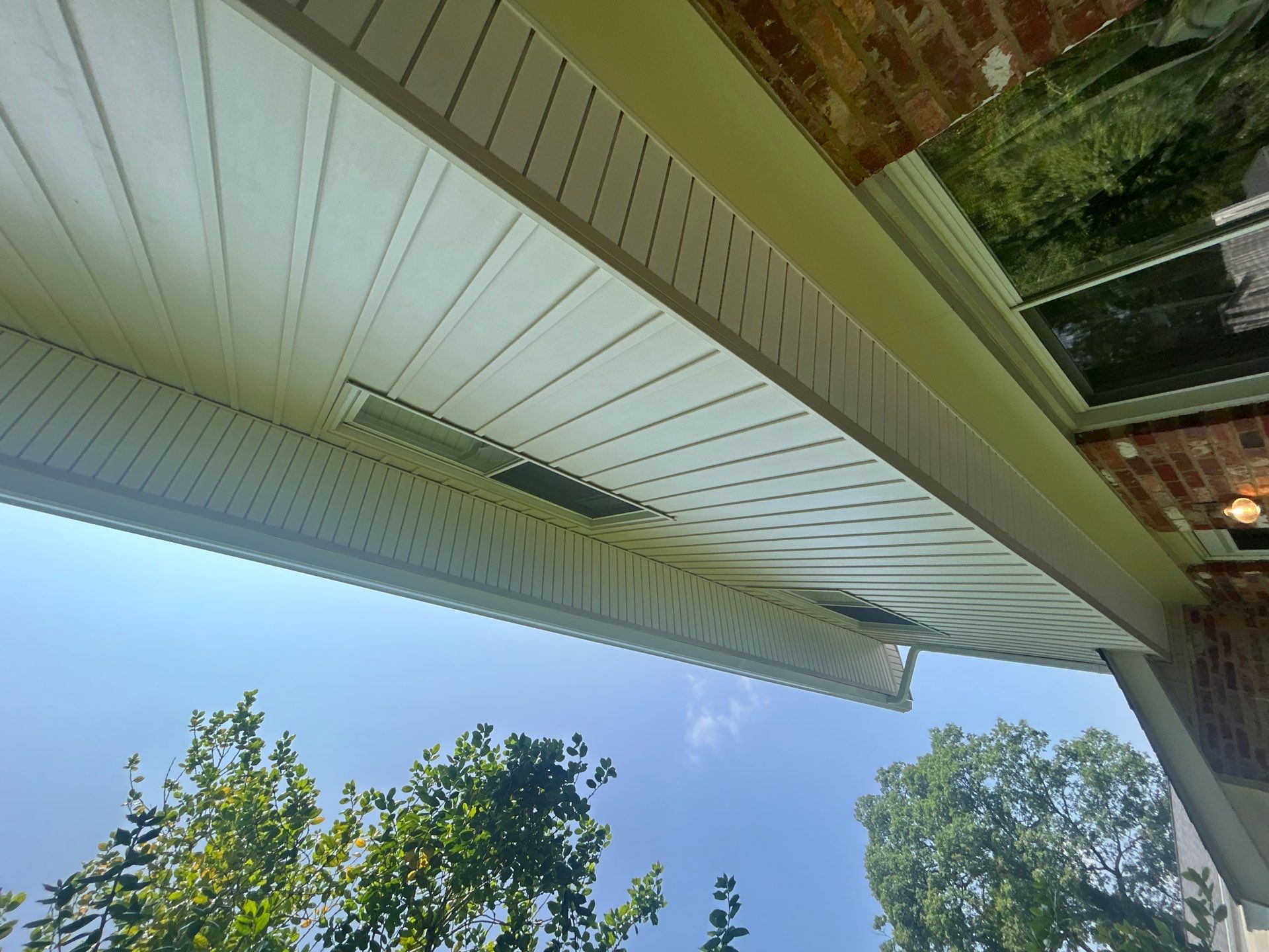 Fairfax: Residential Siding Replacement with CertainTeed 8" Board and Batten Siding in Desert Tan by RM Banning, Inc.