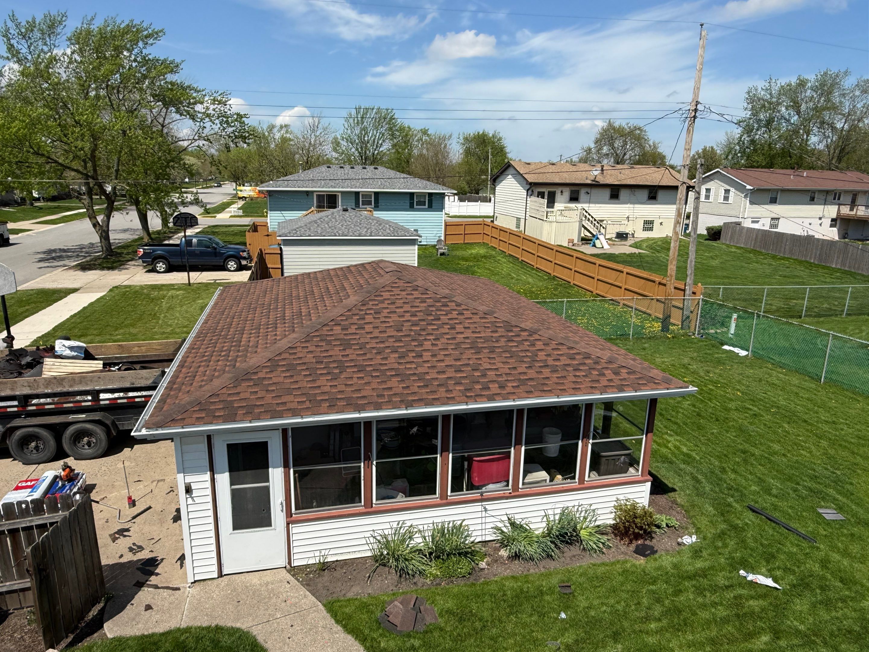 House and garage roof replacement by Optimal Home Improvement 
