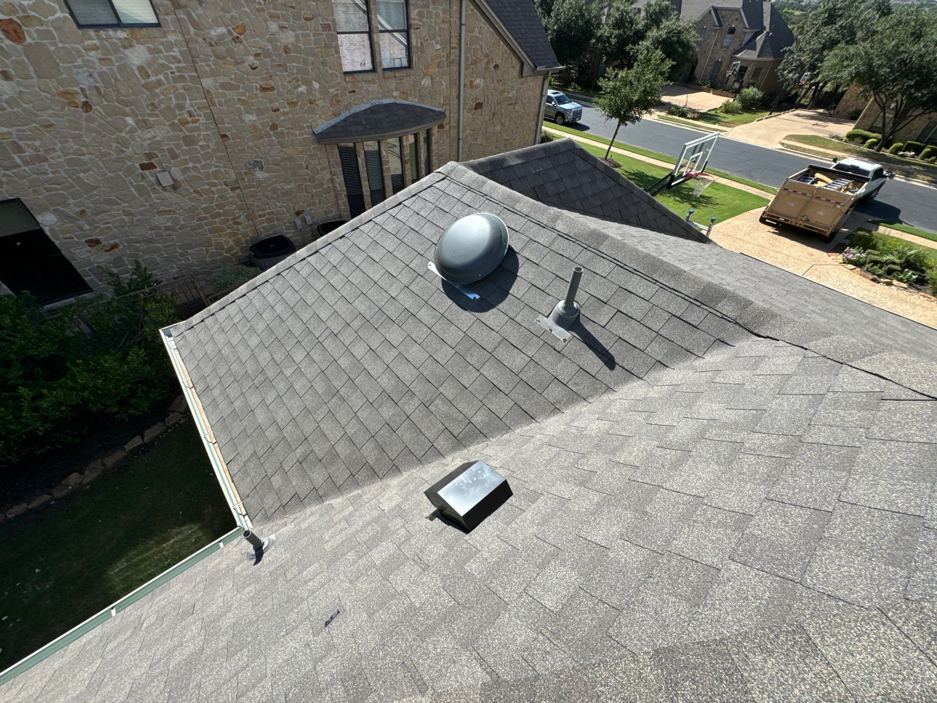 Residential Roofing Installation using IKO, Cambridge in Weathered Wood by Oakwood Roofing and Construction, LLC