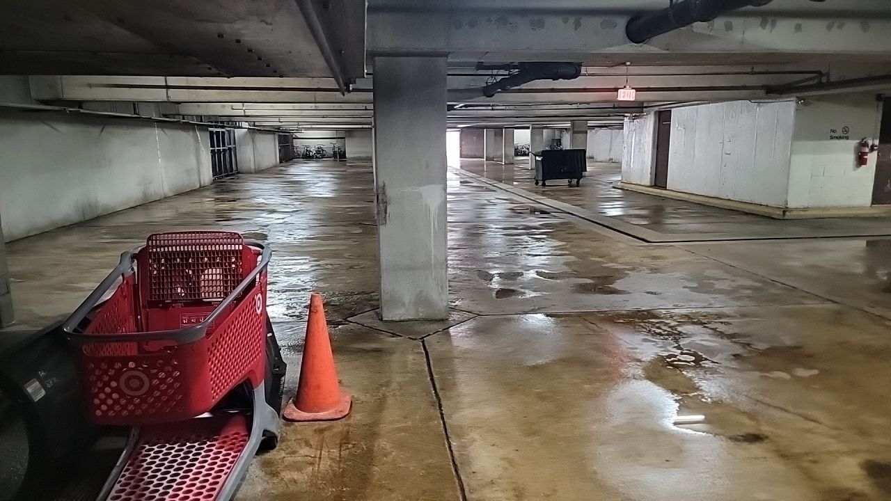 Parking garage using Hot water by Northern Power Washing LLC.