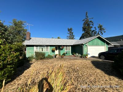 Residential Reroof using Owens Corning Duration Shingles in Sierra Gray.