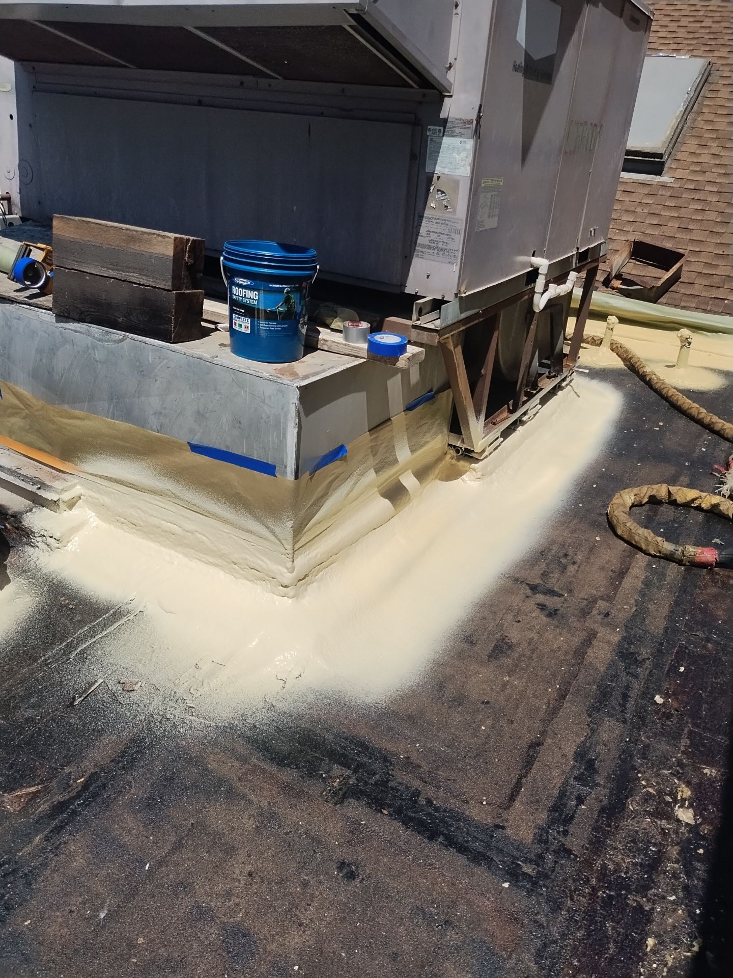 Spray foam and coatings using General Coatings acrylic coatings and spray foam by Straight Edge Roofing Inc