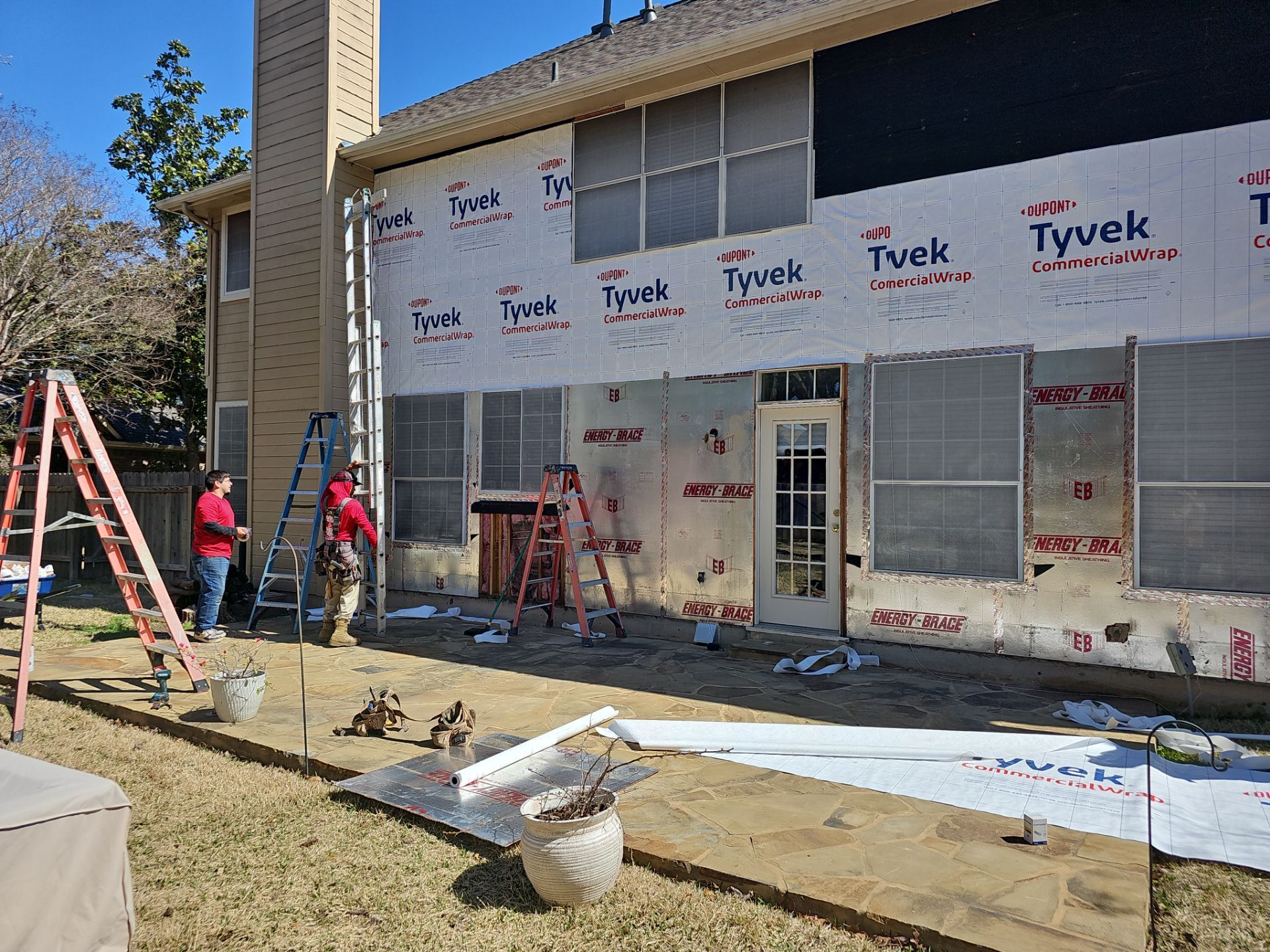 New Hardie Lap Siding & Board and Batten by DeZign Roofing & Exteriors