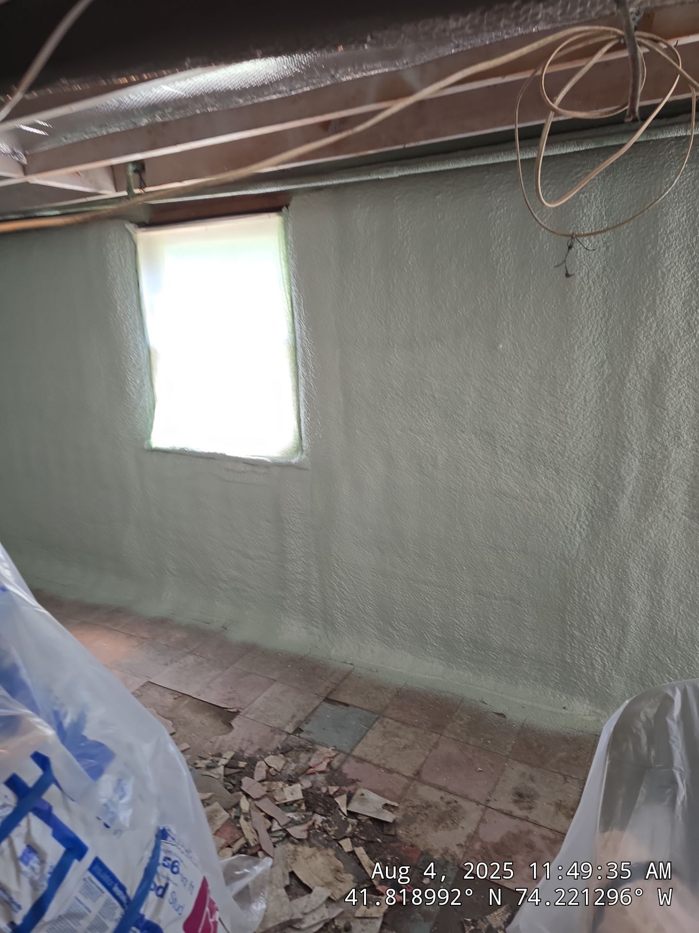 Master bedroom Exterior Walls using open cell spray foam by NYS Foam & Energy
