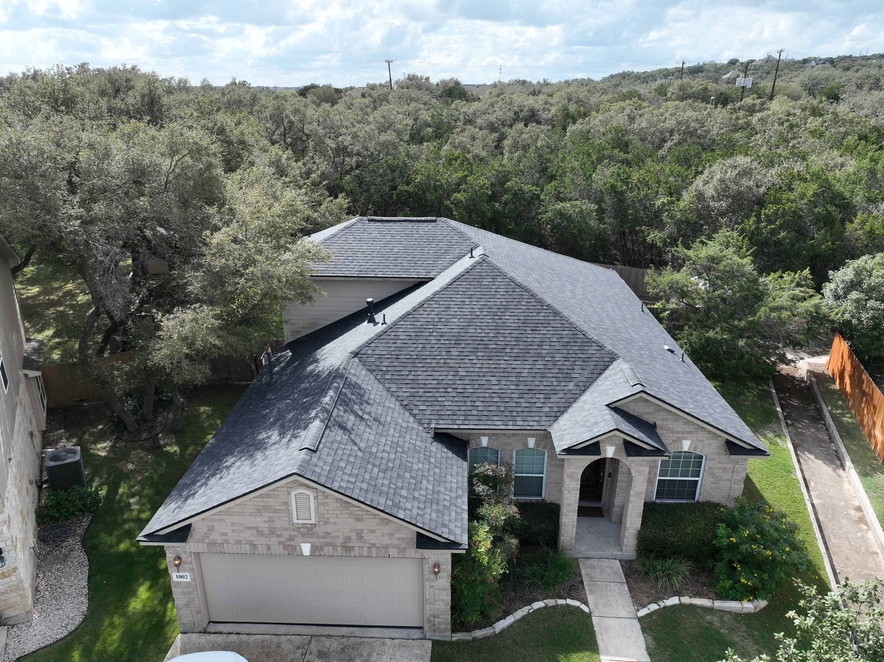 Residential Roof Replacement using Owens Corning Duration Shingles - Onyx Black by Premier Roofing and Contracting