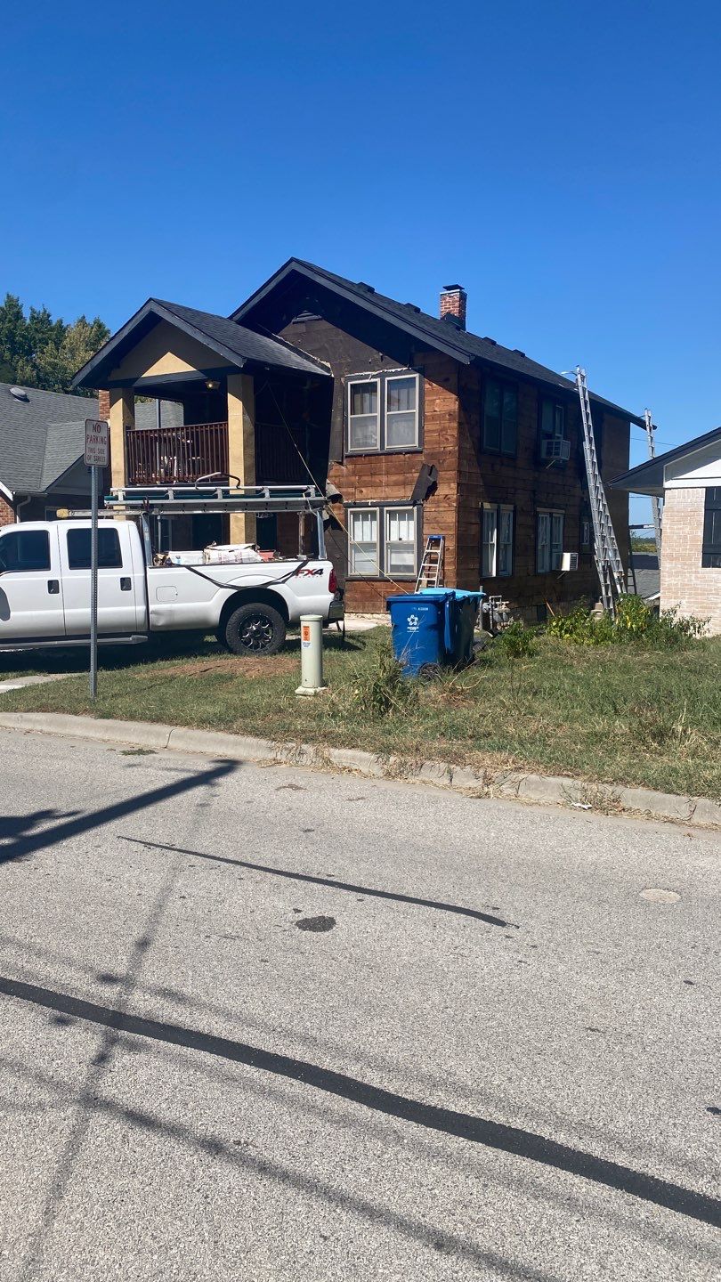 Siding Installation using Elm Grove by EEC  Windows, Siding & Roofing 
