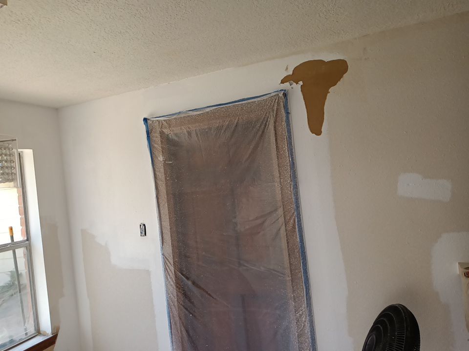 Interior and exterior painting project by Roof Concepts Construction