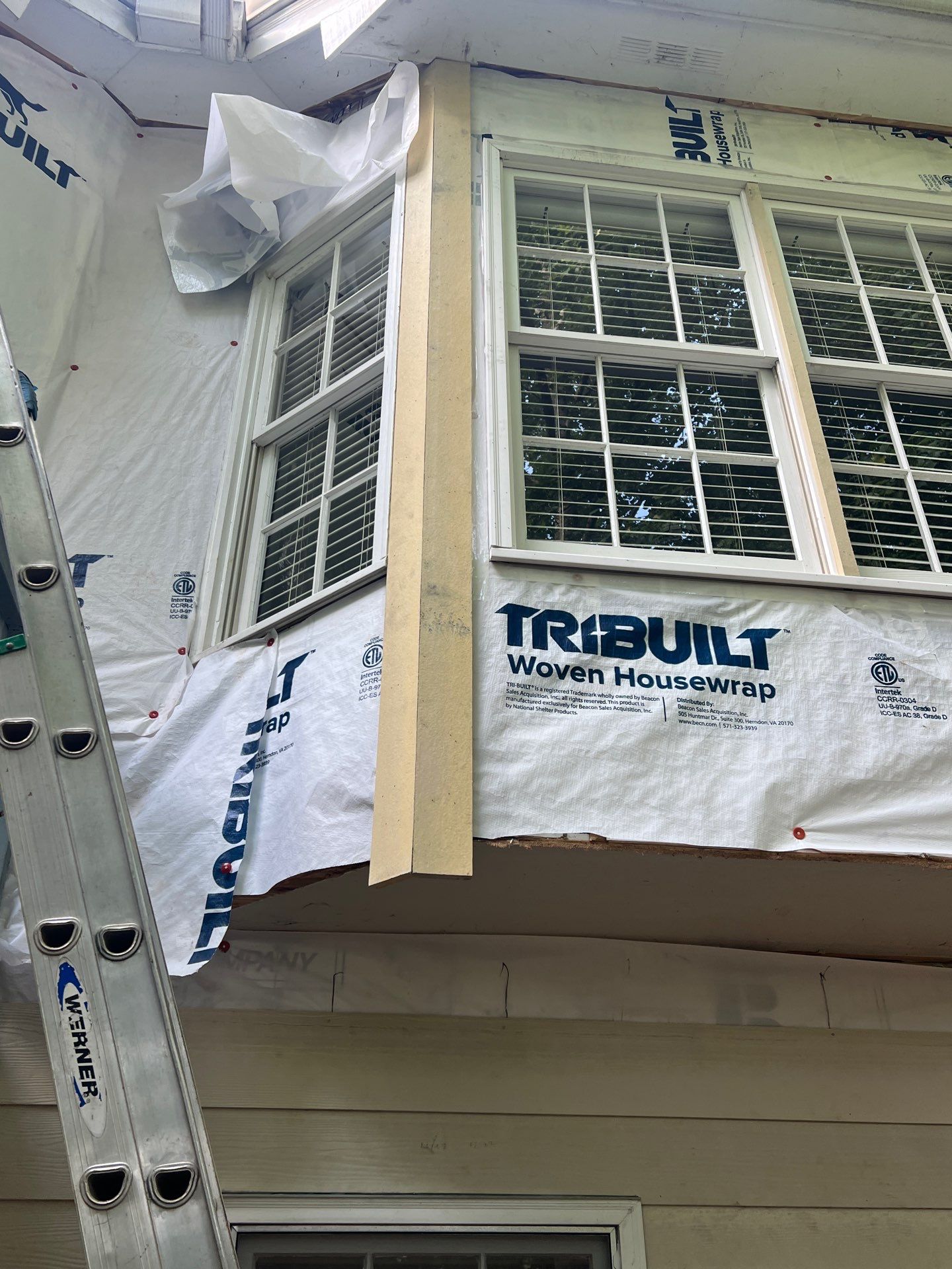 Blue Exterior Paint and Siding Installation using James Hardie Lap Siding by Nelson Exteriors