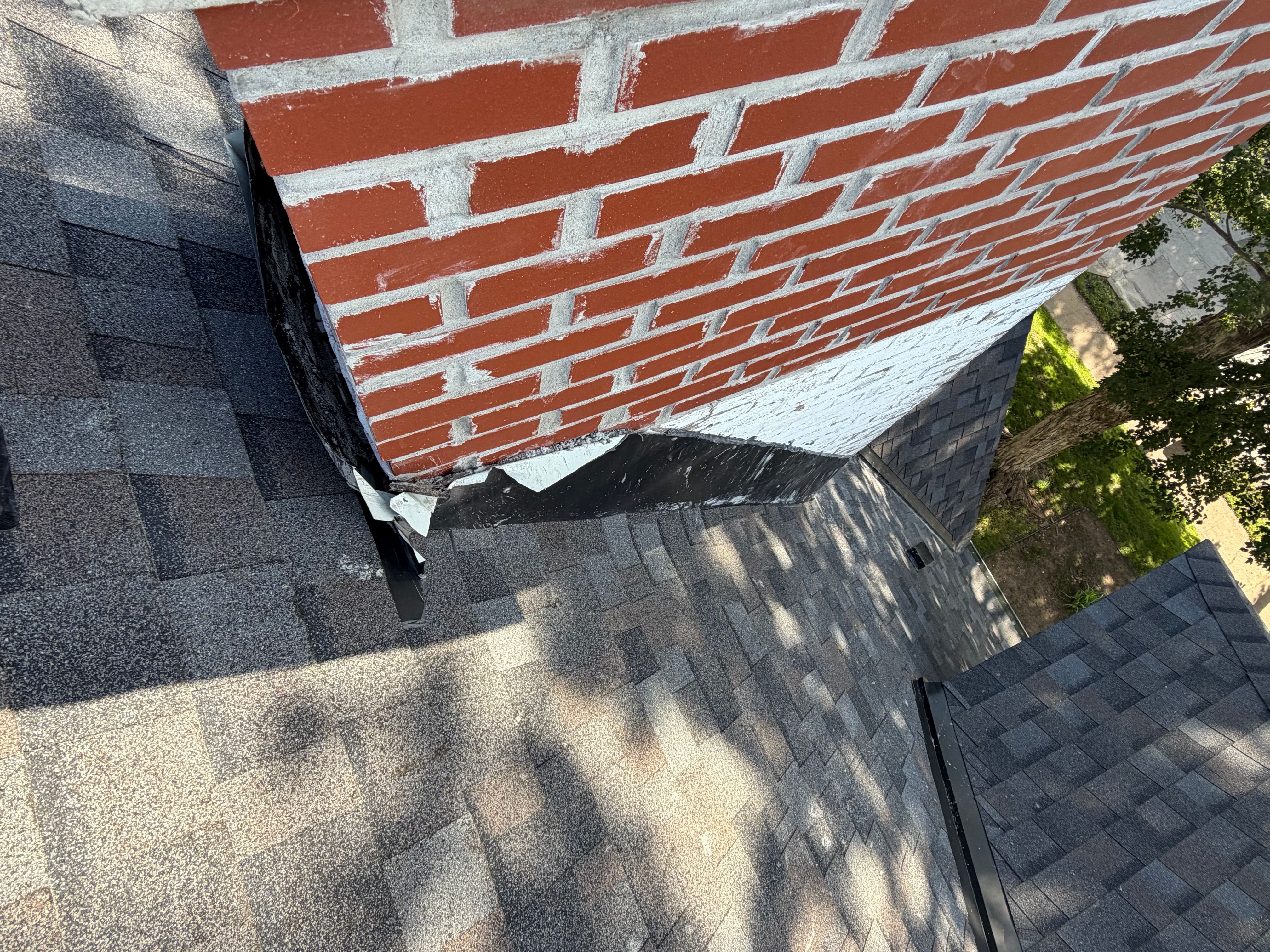 Brick Chimney Flashing and Roof Repair in Kansas City by Summit Roofing
