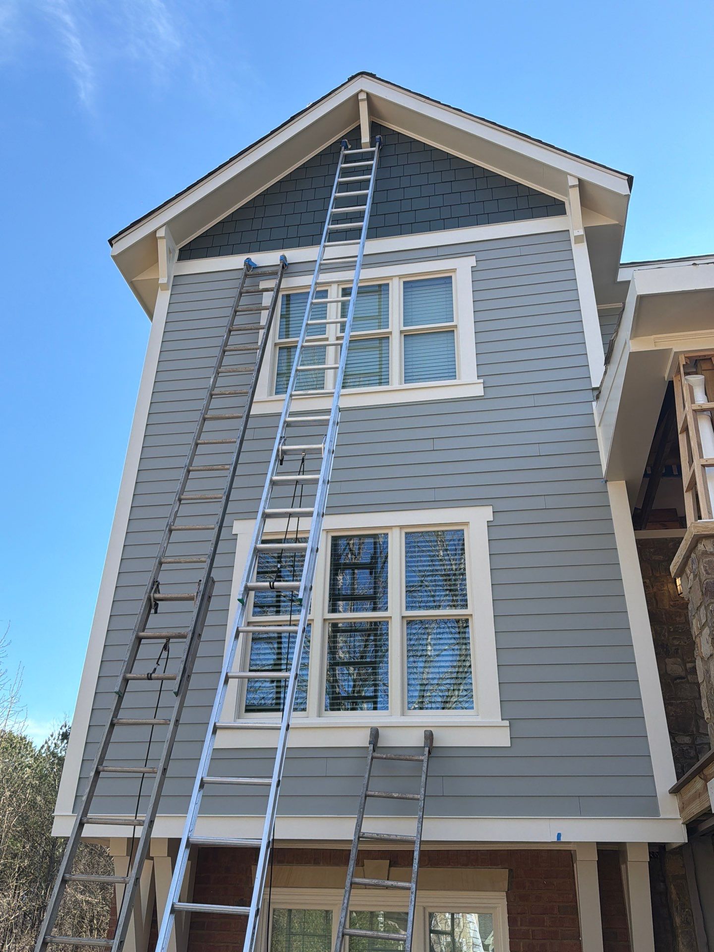 James Hardie Siding Replacement, Exterior Painting, Deck Stain, and Gutter Installation in Peachtree Corners, GA by Nelson Exteriors