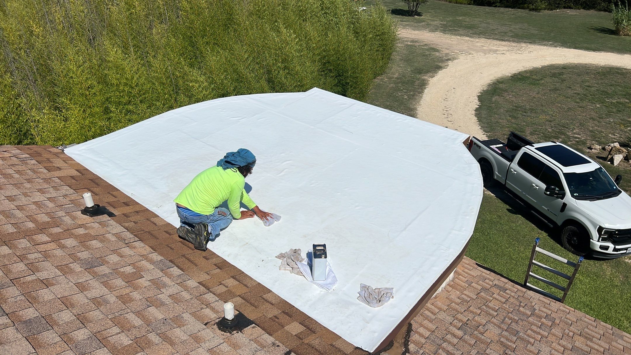 Residential Roofing Installation using TPO Flat Roof by Harvey Roofing & Construction