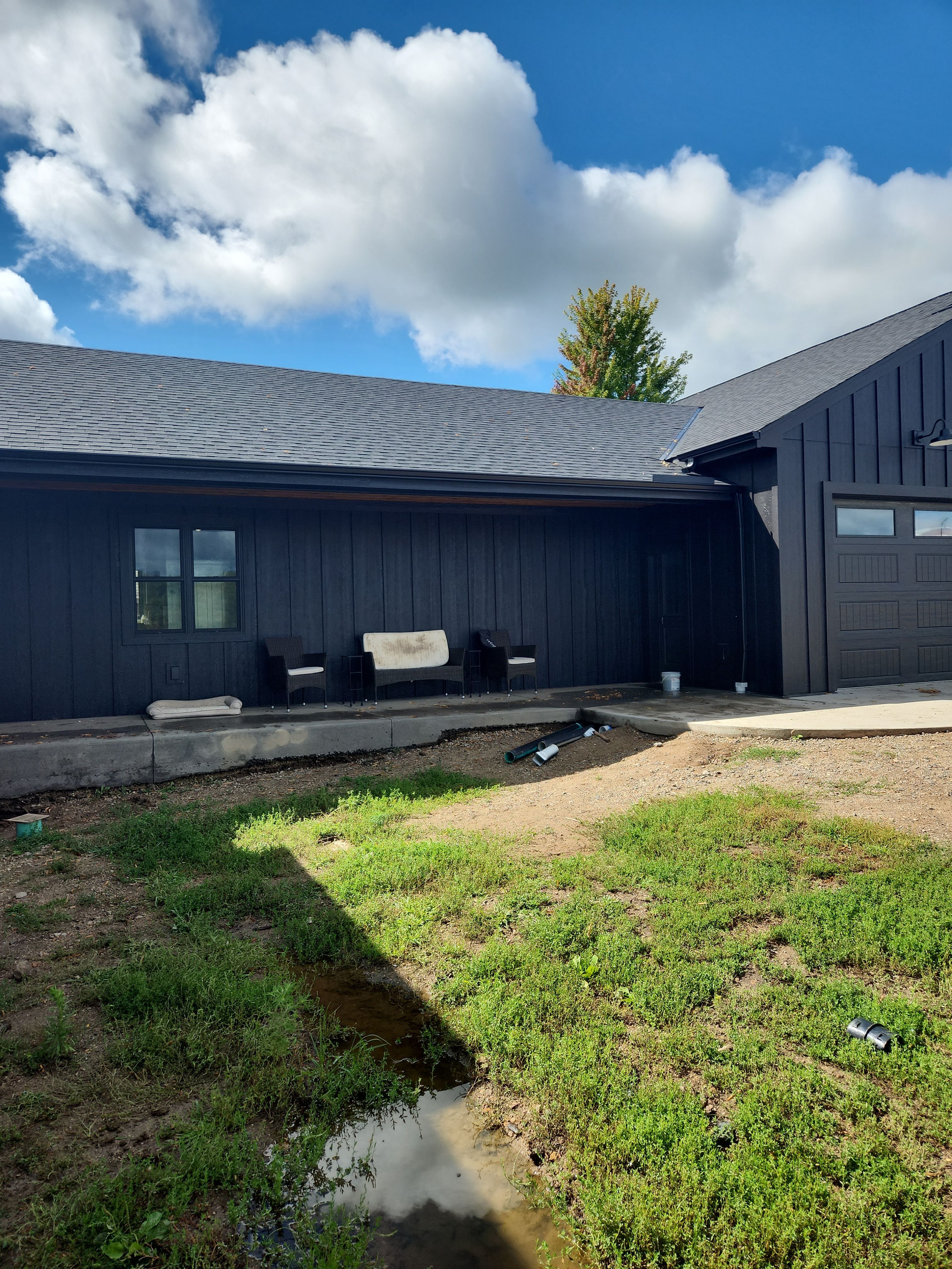 Black Seamless Gutters in Buffalo, MN by Next Level Seamless Gutters / Exteriors Inc.