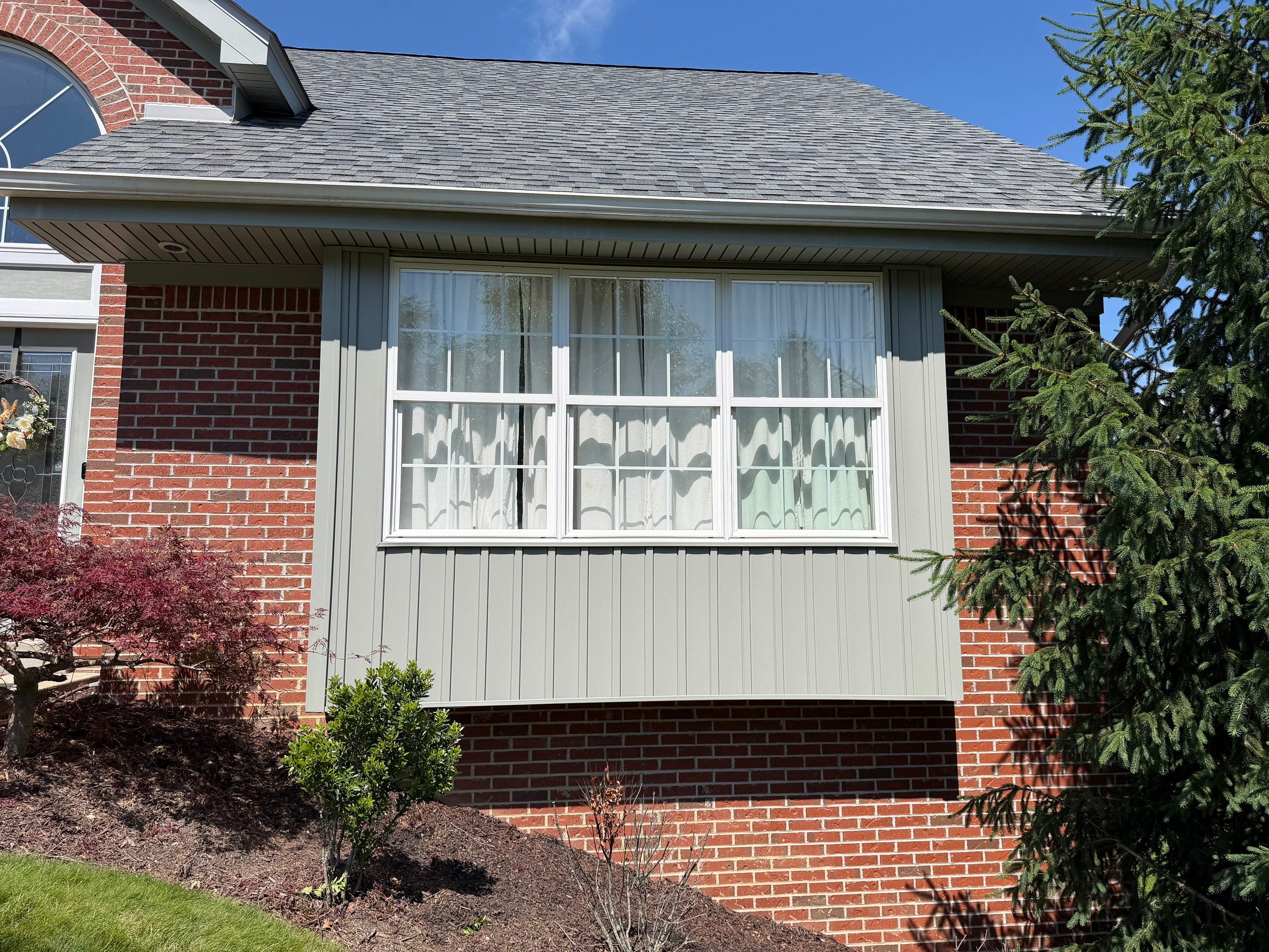 Mastic Board and Batten in Scottish Thistle by Ideal Siding Pittsburgh