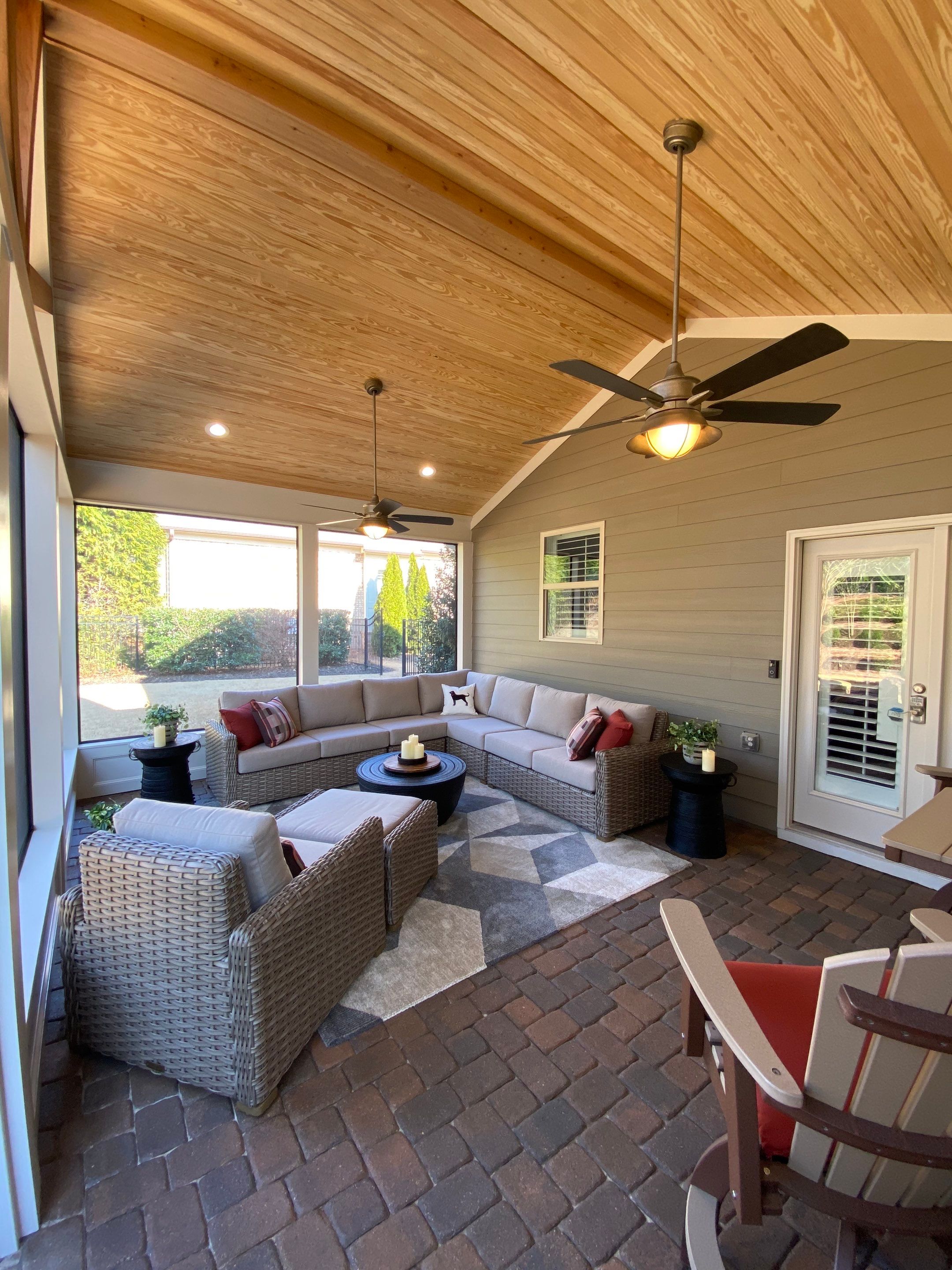 Custom Screened Porch Addition with Vaulted Wood Ceilings in Woodstock by Swift Home Renovations