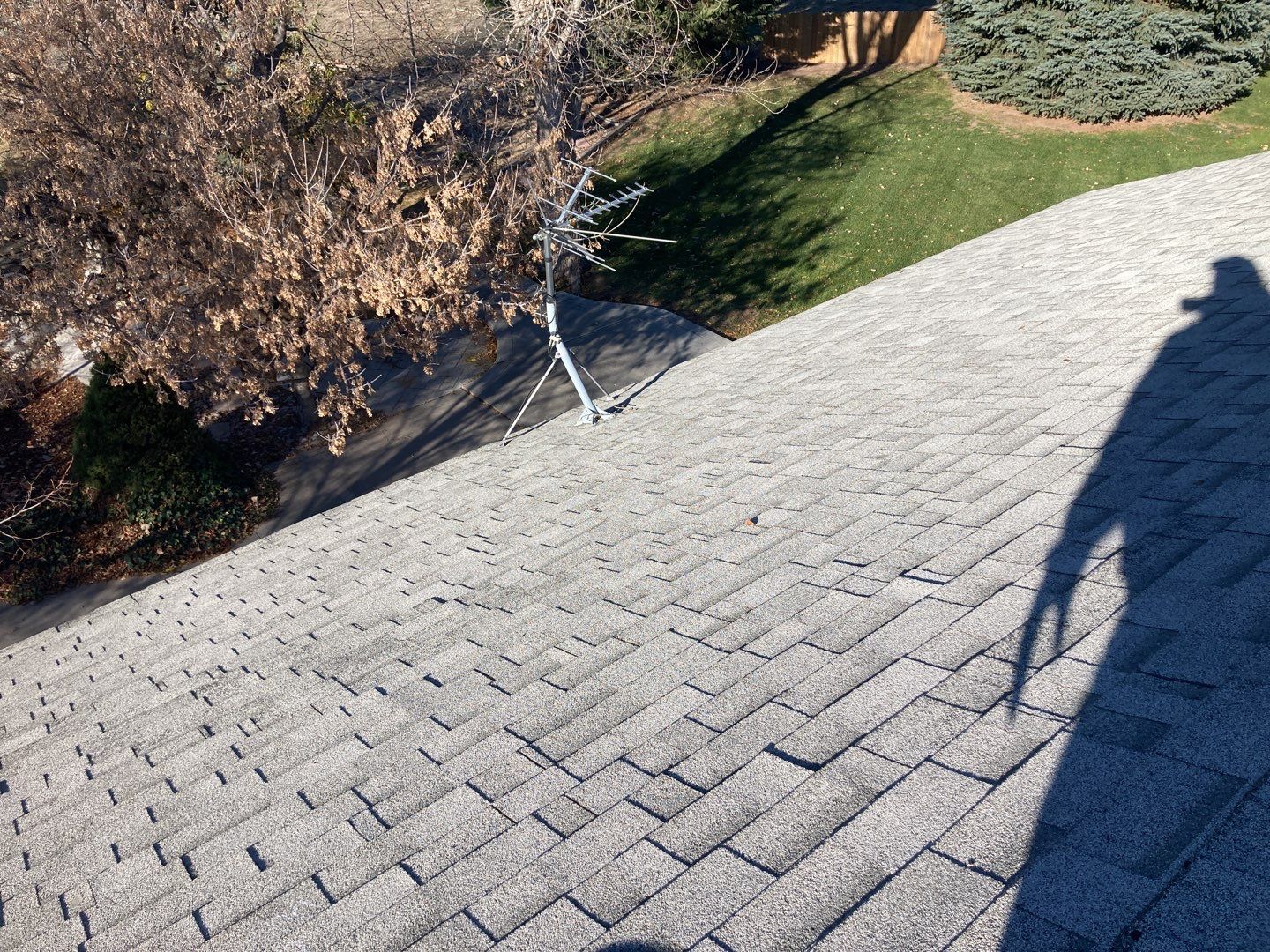 Two story farmhouse style roofing installation using Owens Corning Duration in the color Teak by ID Roofing LLC