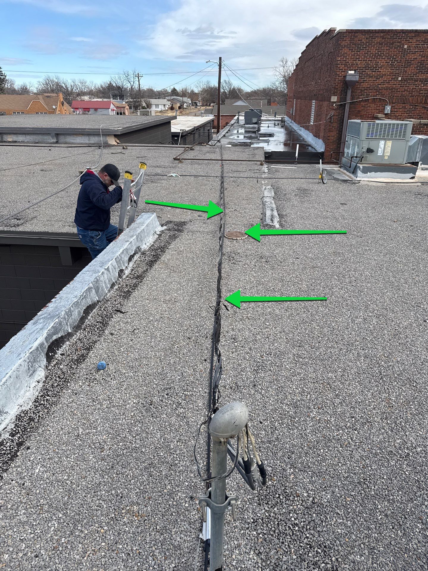 Hollis High School Comprehensive TPO Roof Replacement and Restoration by Secondary Rhodes