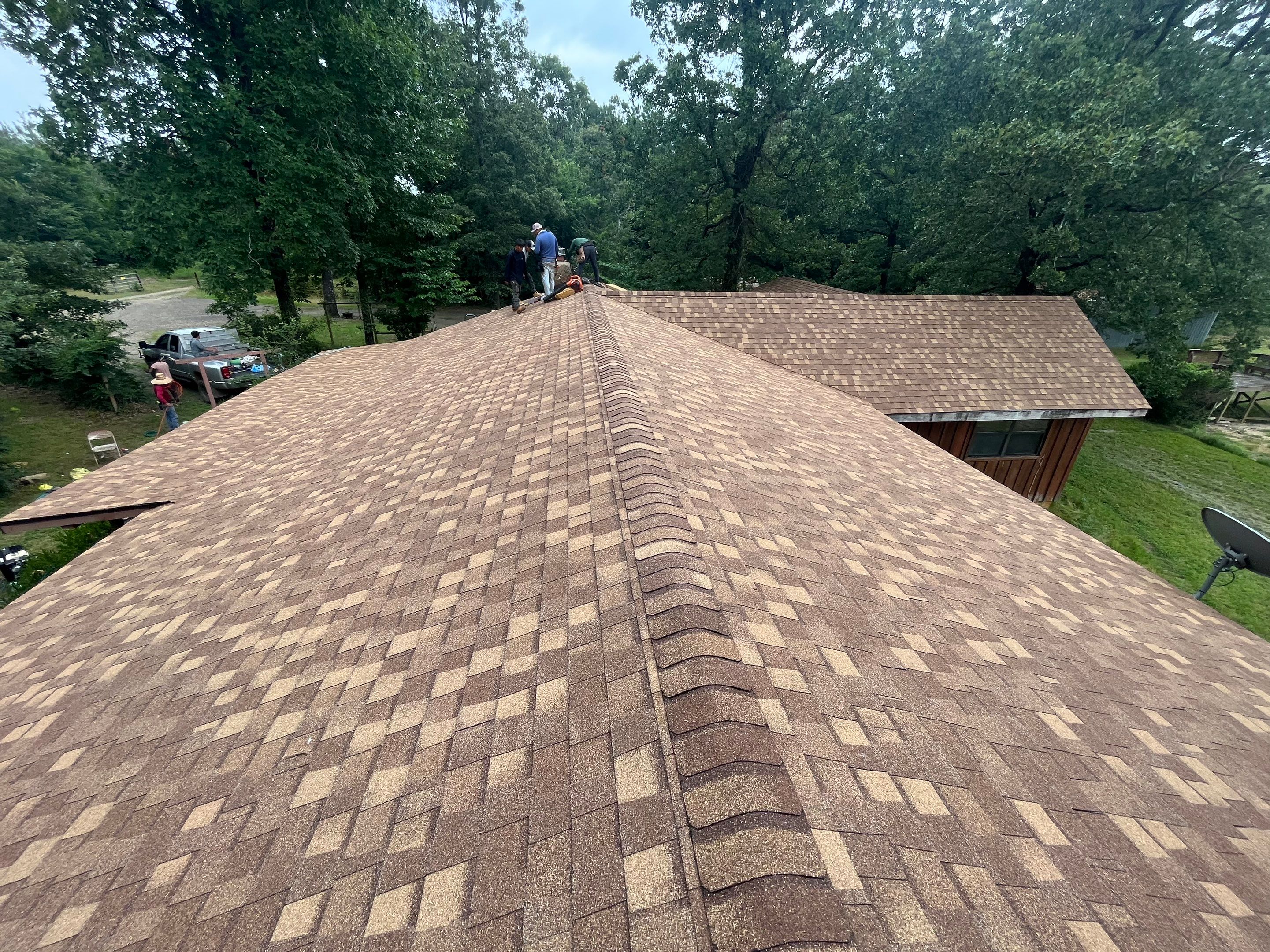 Storm Restoration Reroof: 25 Year 3-Tab Shingle by Hostetler Roofing