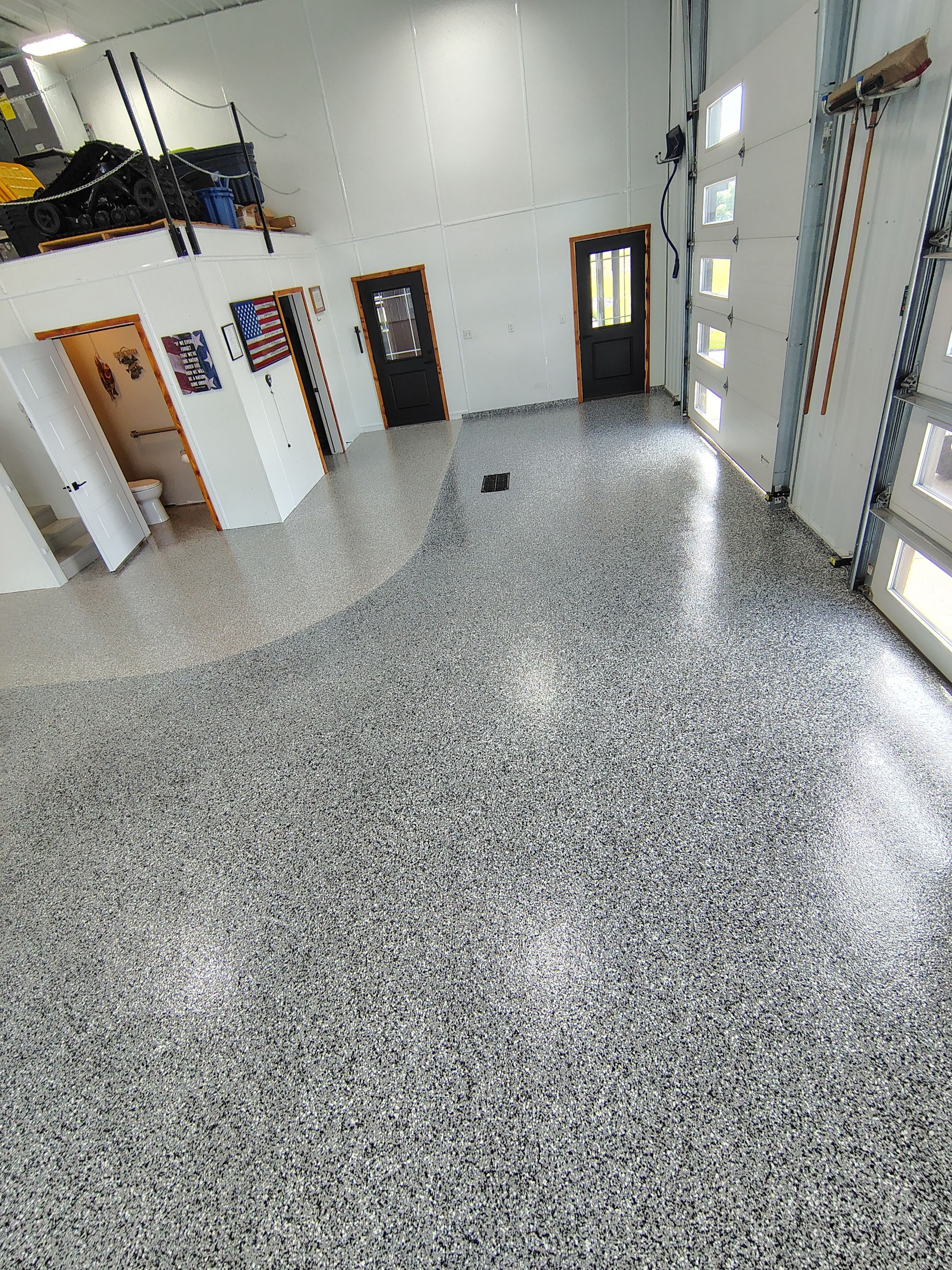 Multi-Stage Concrete Floor Coating for Egan Shop and RV Storage by Select Painting, Coatings & Garage Cabinets