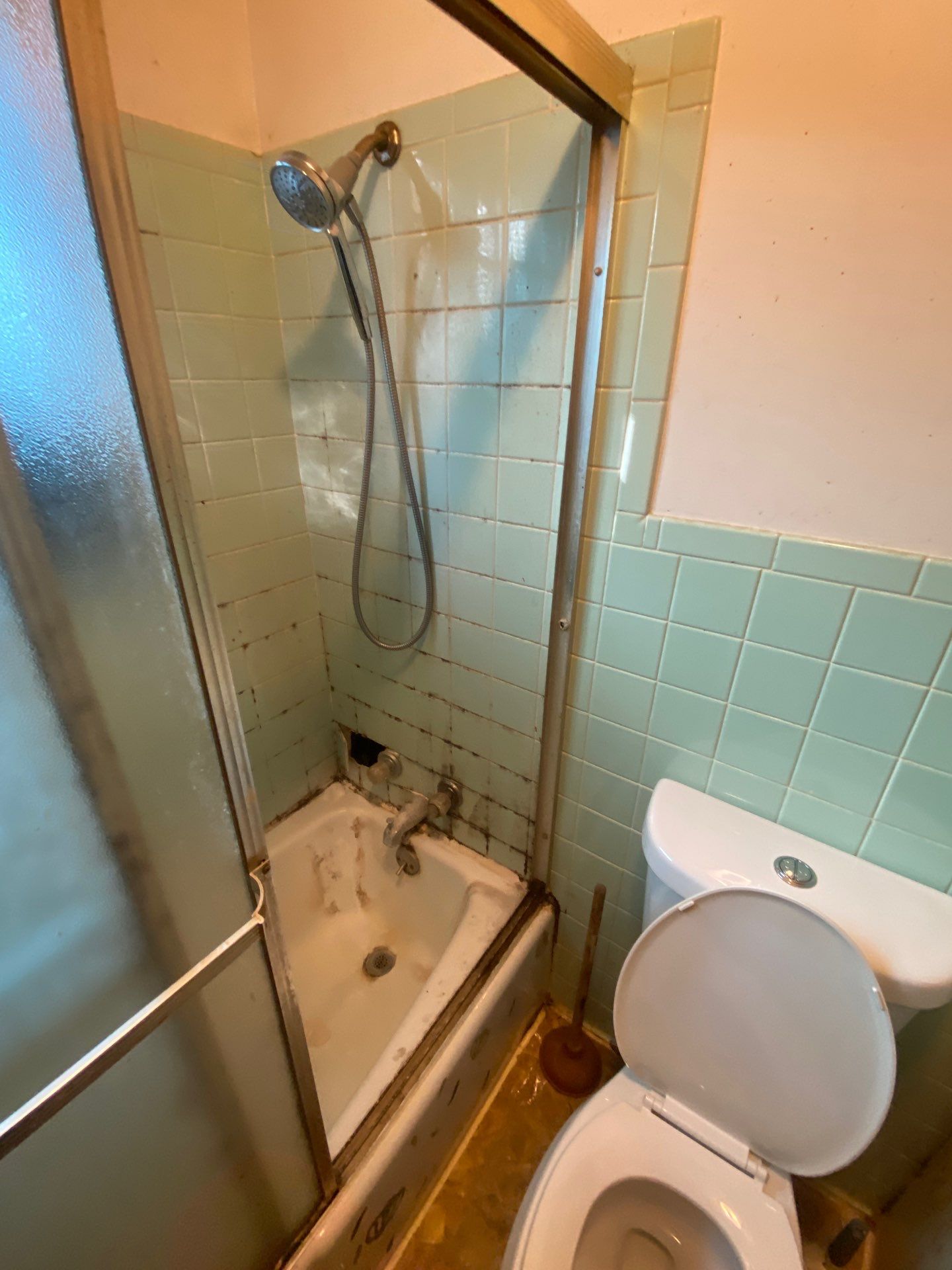 Tub to Shower Conversion using BCI Acrylic Shower System by Secure Construction Company Inc