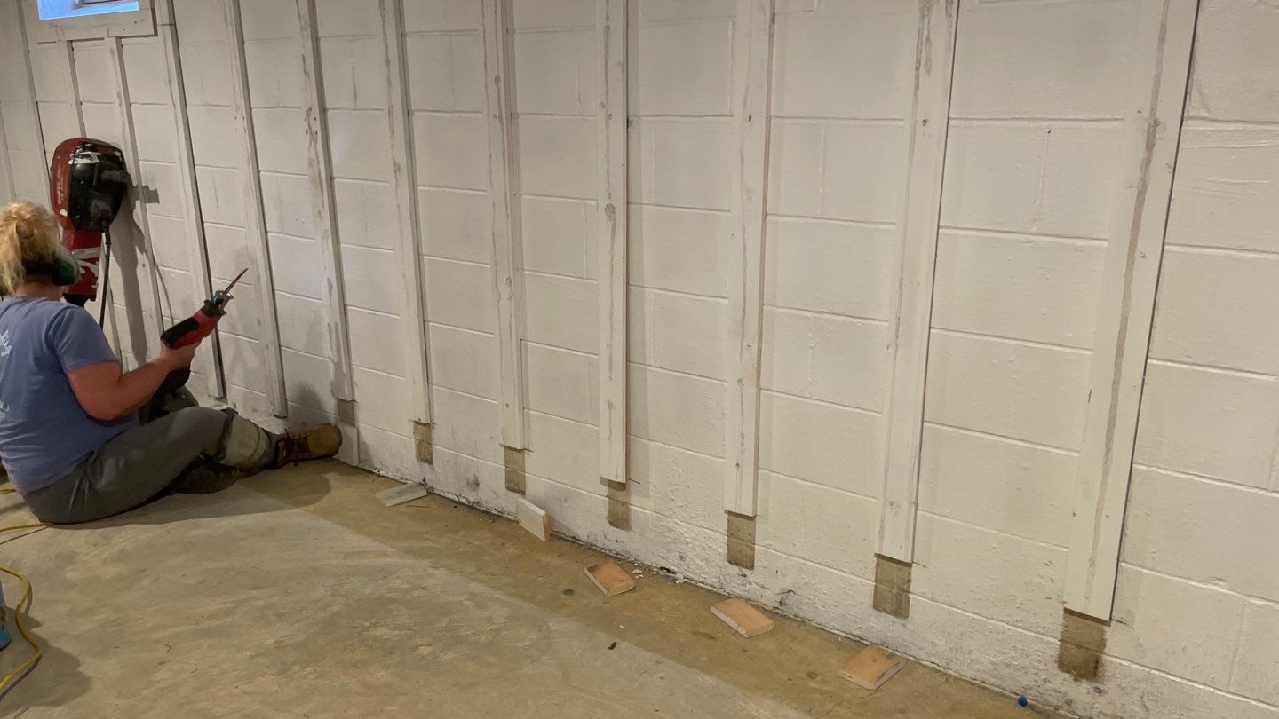 Interior Drain Tile & Buried Discharge in St. Anthony, MN by Waterproofing Northeast