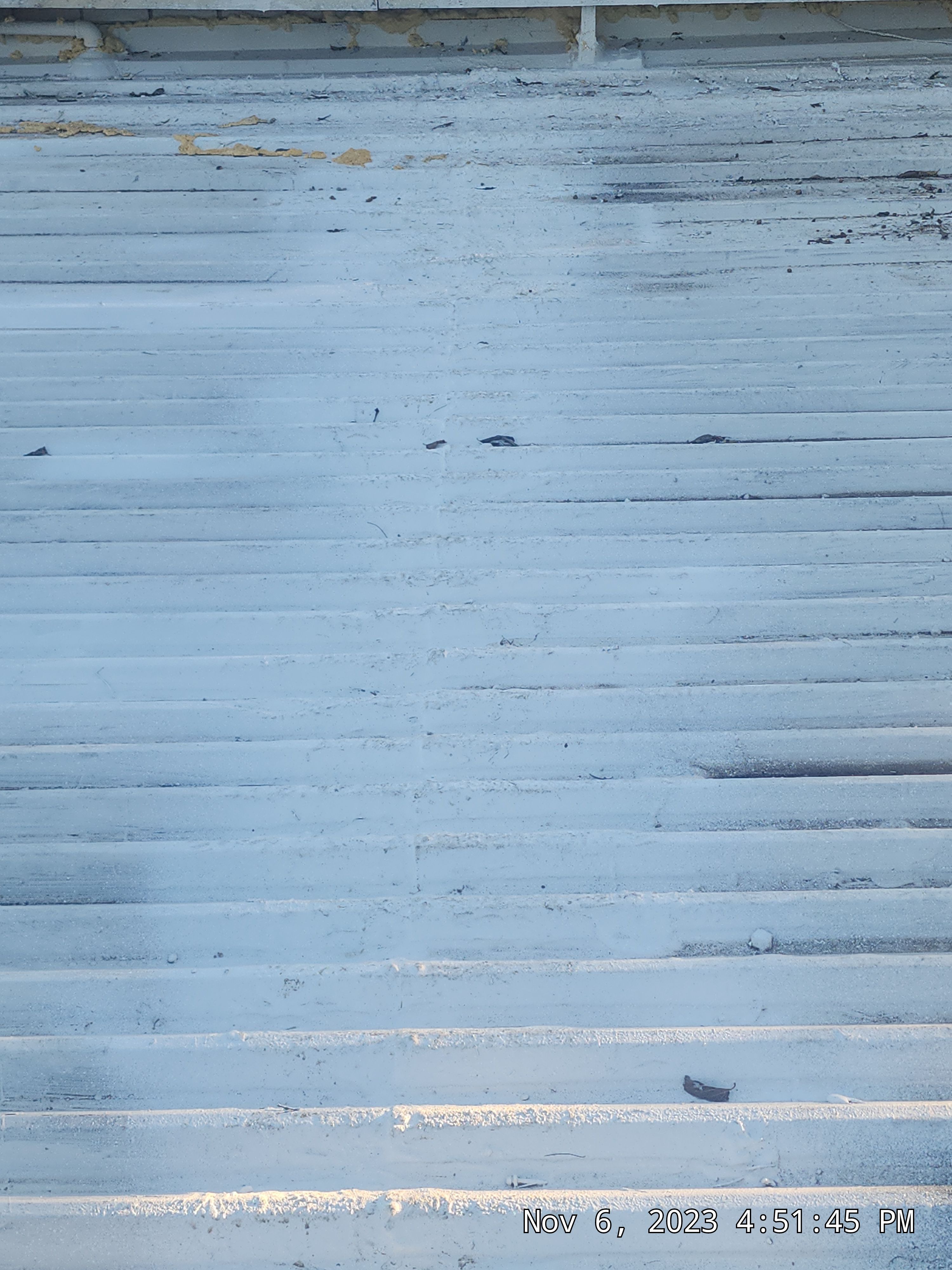 Commercial roofing overlay using GAF TPO over an old ballast roof by Becker Roofing and Exteriors