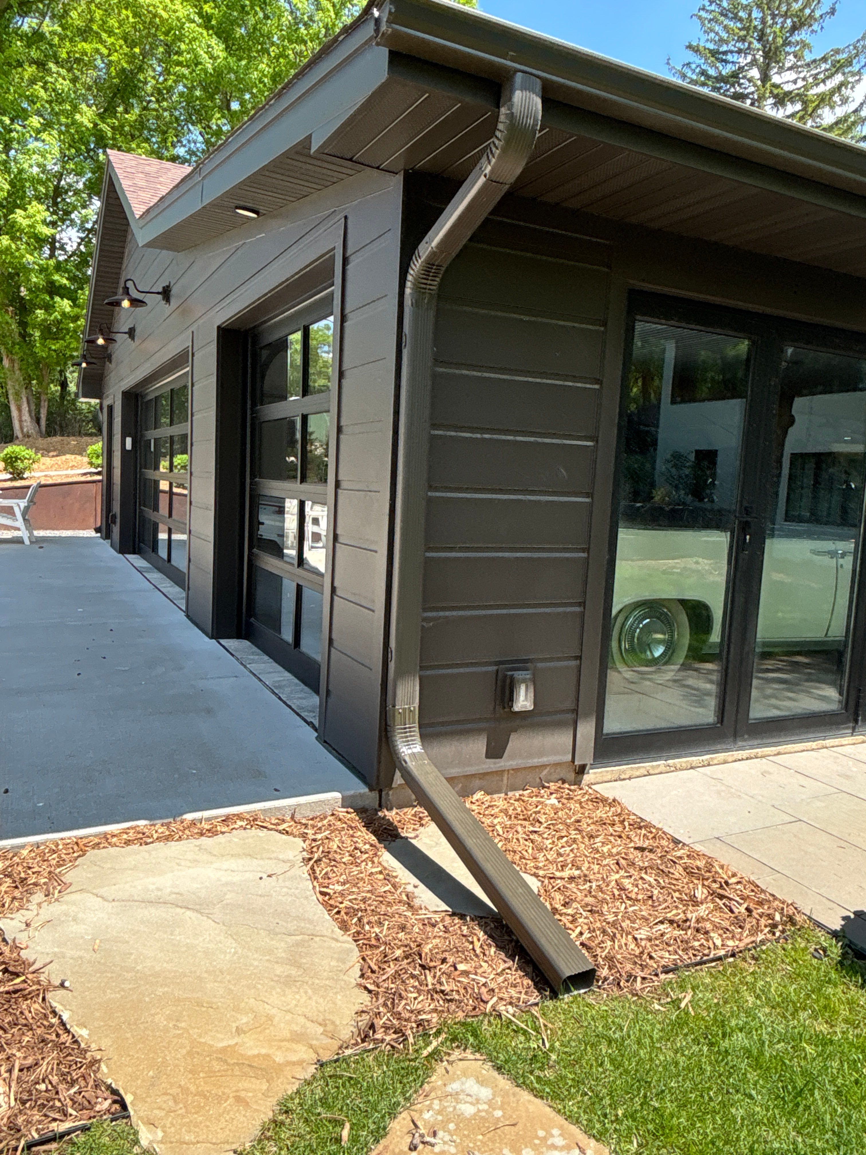 Mocha Downspout Rework – Maple Grove, MN by Next Level Seamless Gutters / Exteriors Inc.