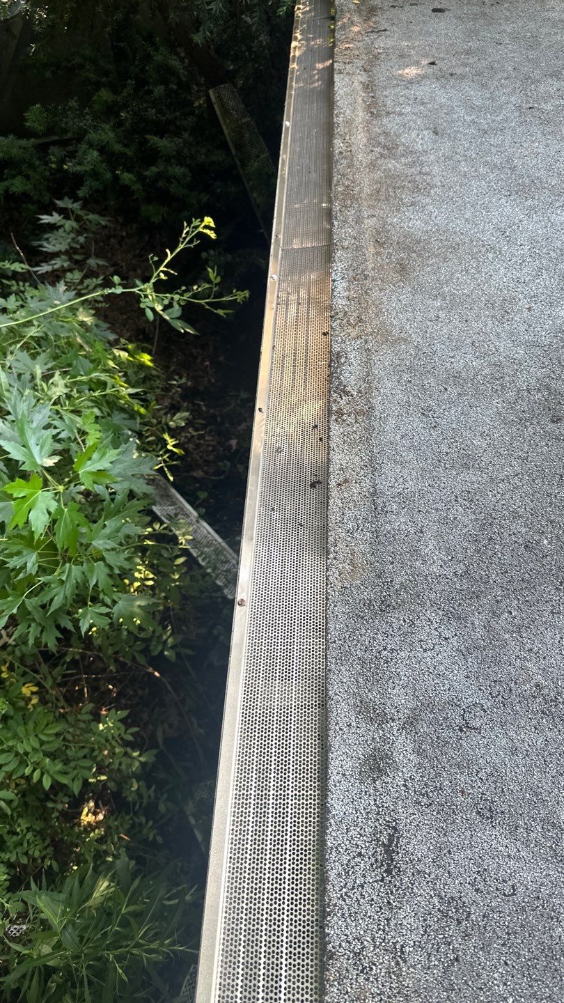 Very overdue gutter cleaning and screening by Above All Gutters 