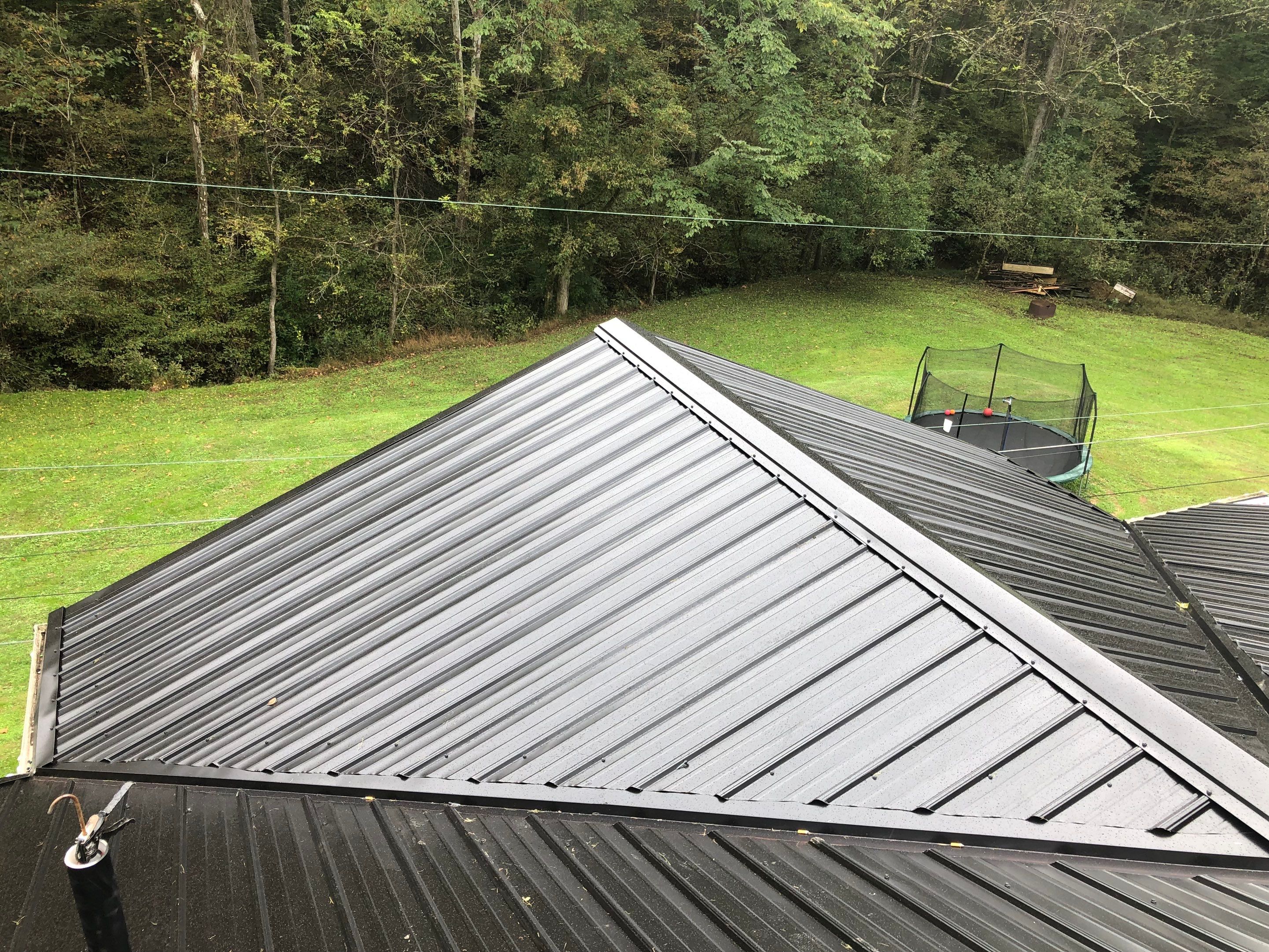 Metal Roof and Vinyl Siding, Soffit, Gutters using LifeTite Premium metal roofing  by Secure Construction Company Inc