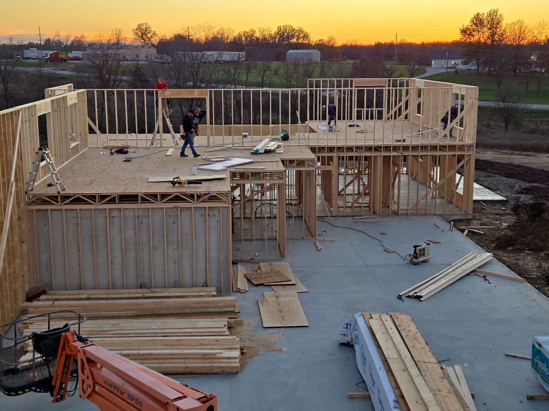 New Home construction w/ board and batten sides and metal roof  by Miles Construction 