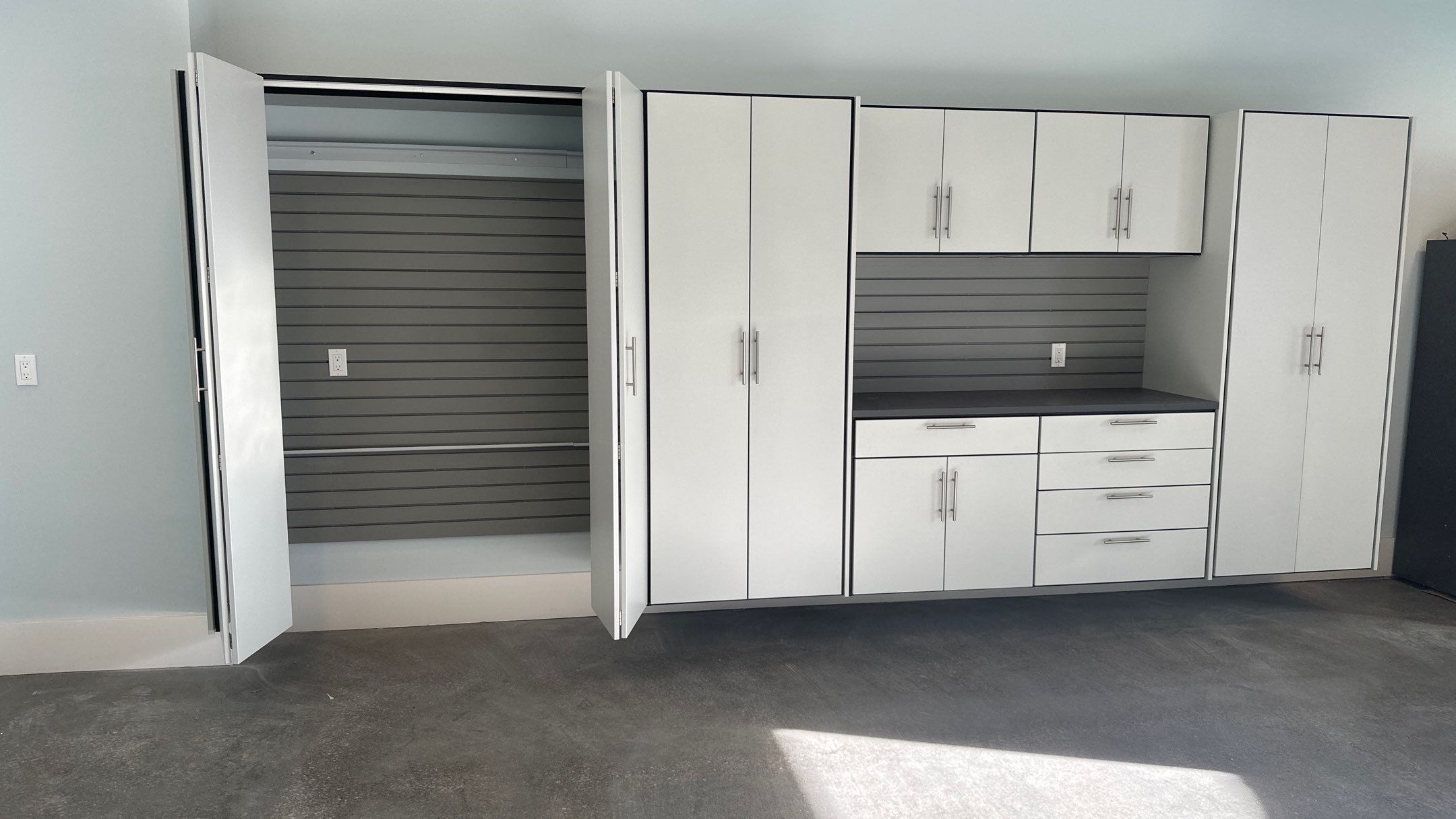 Bryon V. upgrades garage with cabinets and heavy duty slatwall by Banner Garage