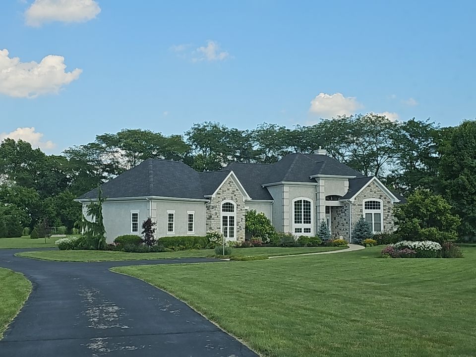 Residential Roofing Installation using Atlas Pinnacle Black Shingles