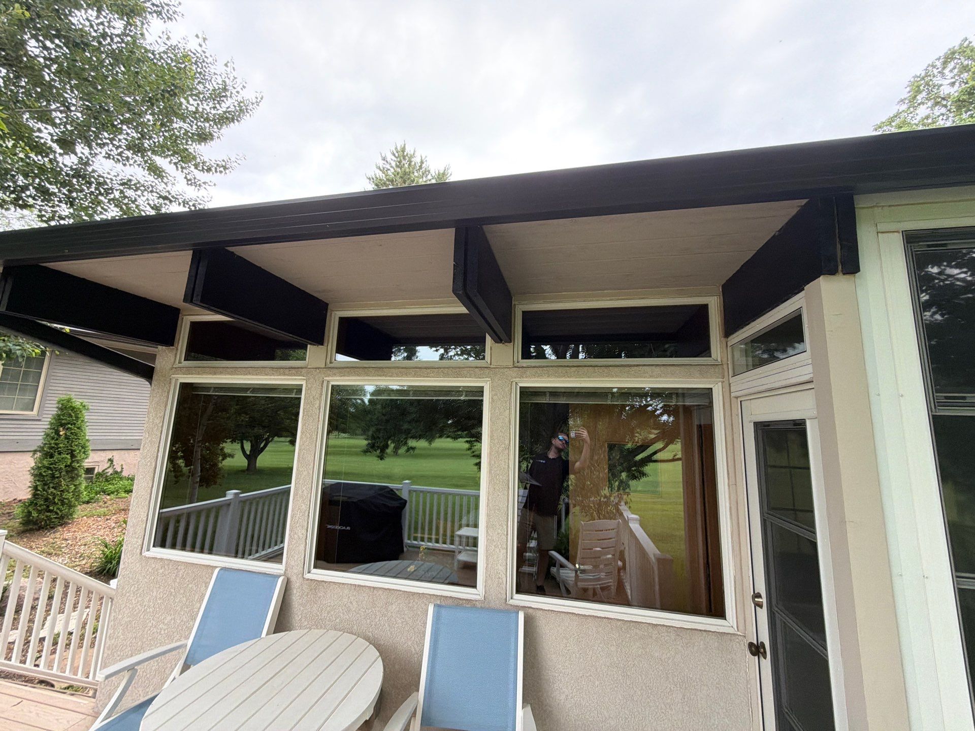 Exterior Trim Painting and Rafter Staining in Sioux Falls by Select Painting, Coatings & Garage Cabinets