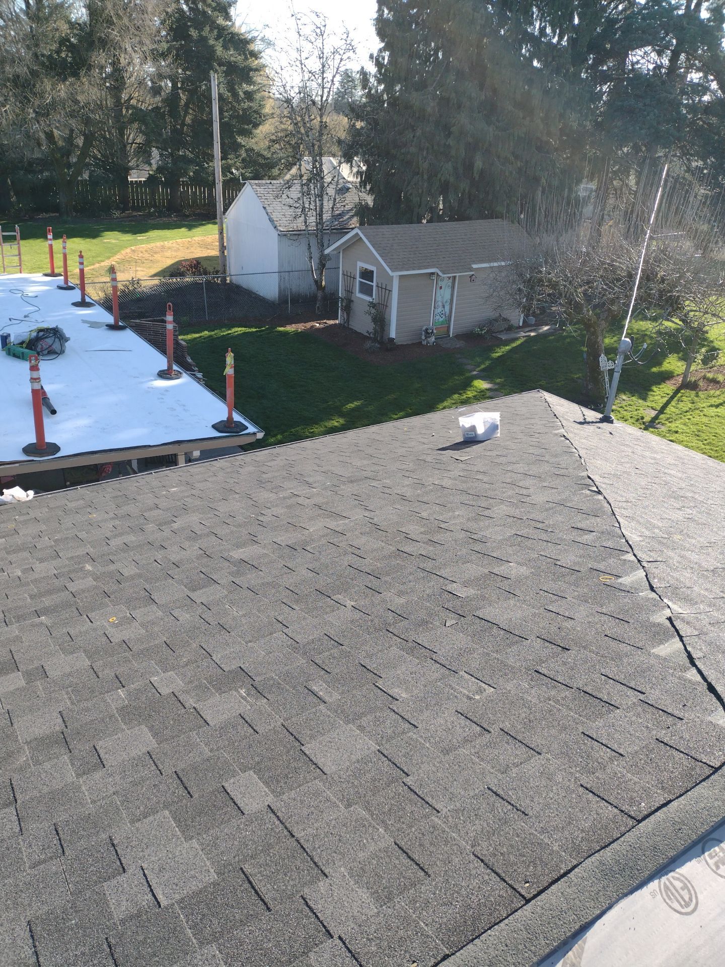 Residential Roofing Installation using IKO Dynasty (Color: Granite Black) by Orezona Building & Roofing Company, Inc.