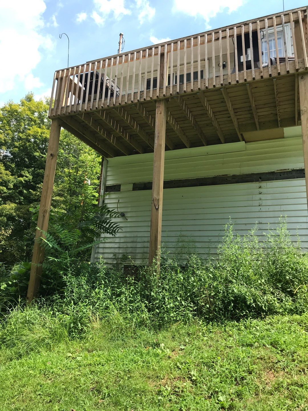 Deck Installation using Pressure Treated Lumber by Secure Construction Company Inc