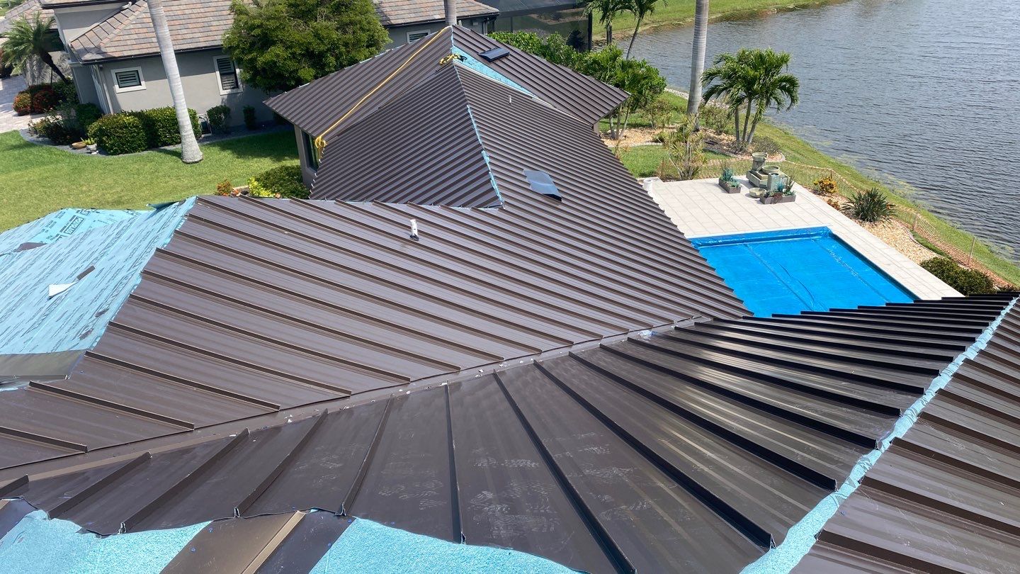 Residential Roofing Installation using Standing Seam Metal Roof in Cape Coral, FL by International Roofing