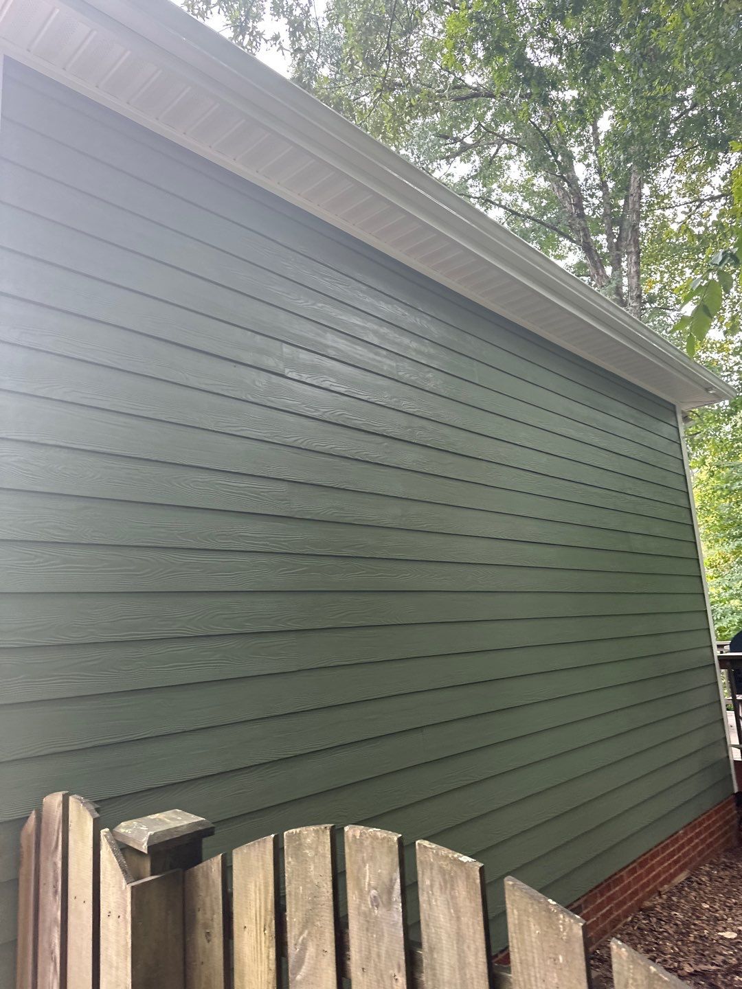 Raleigh Siding and Window Replacement with Custom Green Finish by The Remodeling Company