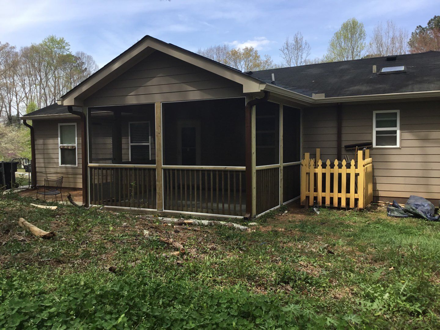 Screened Porch Construction with Vaulted Wood Ceiling in Douglasville by Swift Home Renovations