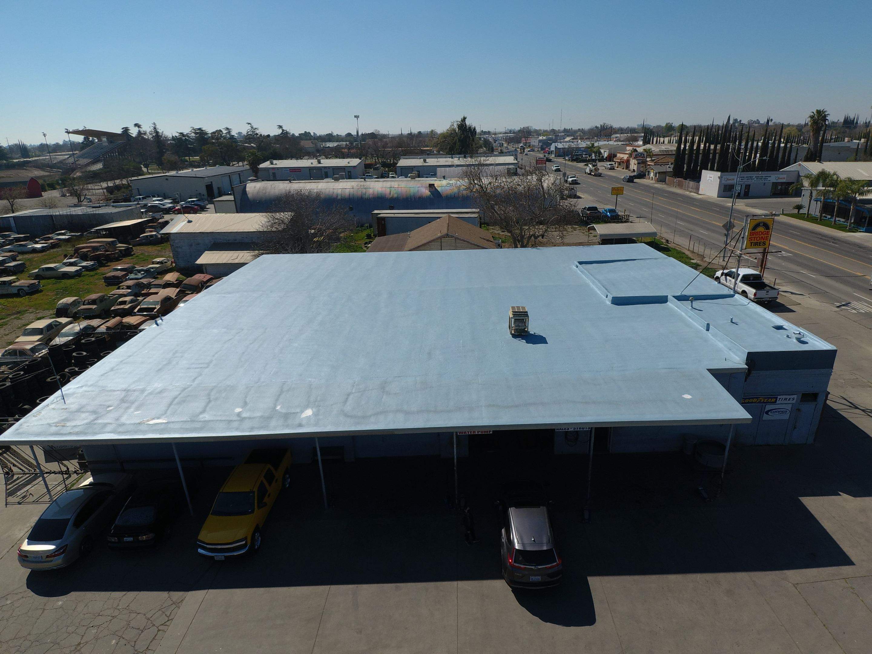 Spray foam and coatings using Conklin Benchmark/PUMA XL coatings and spray foam by Straight Edge Roofing Inc