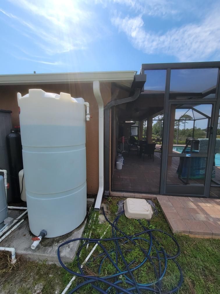 Linen seamless gutters and downspouts installation in Sarasota, FL by Gutter Professors