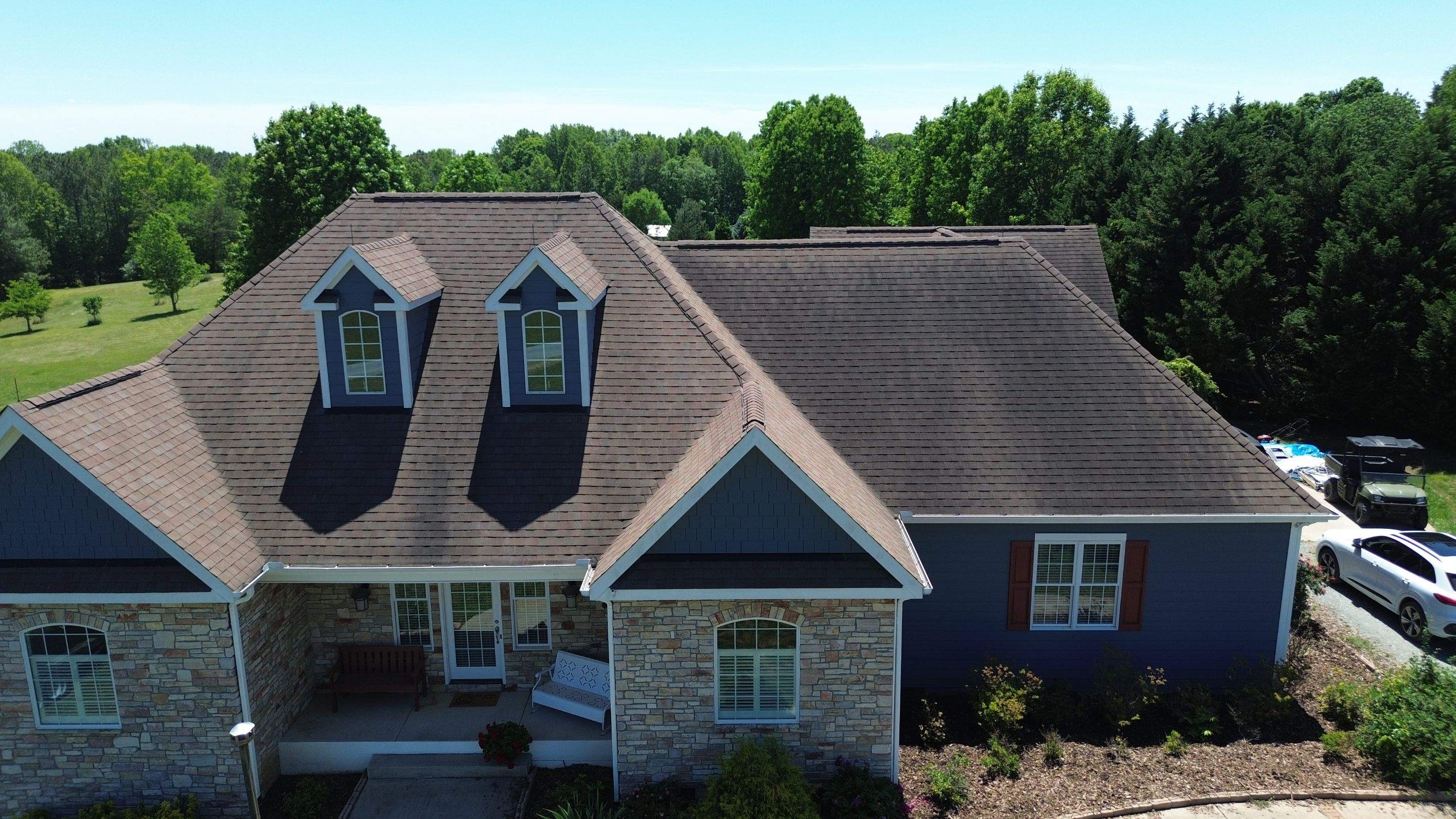 Roof and gutters replacement by hail damage by Just Brilliant Restoration JBR
