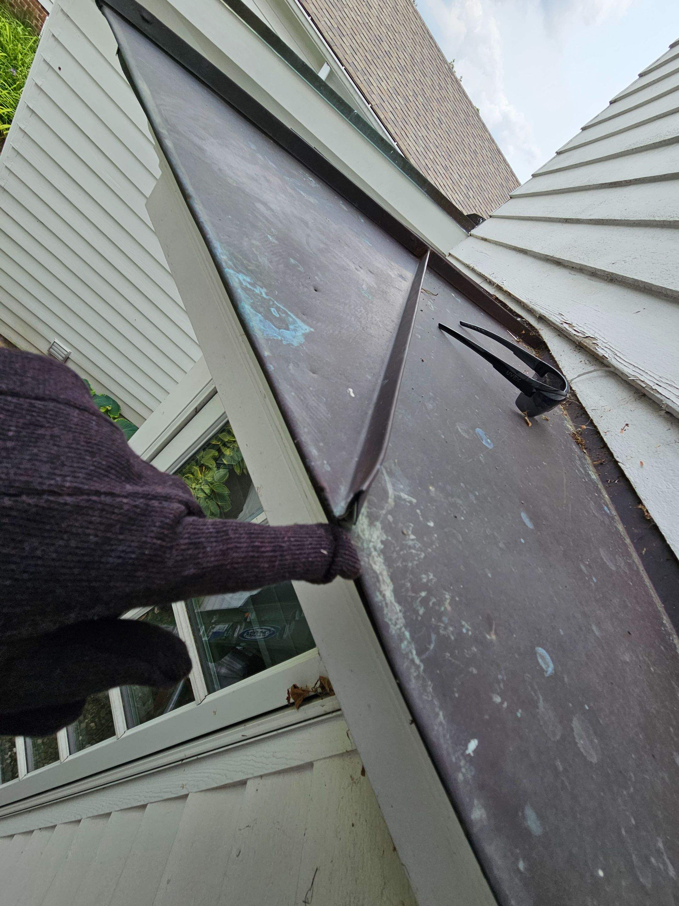 Copper Roof using Copper by Absolute Roofing and Construction