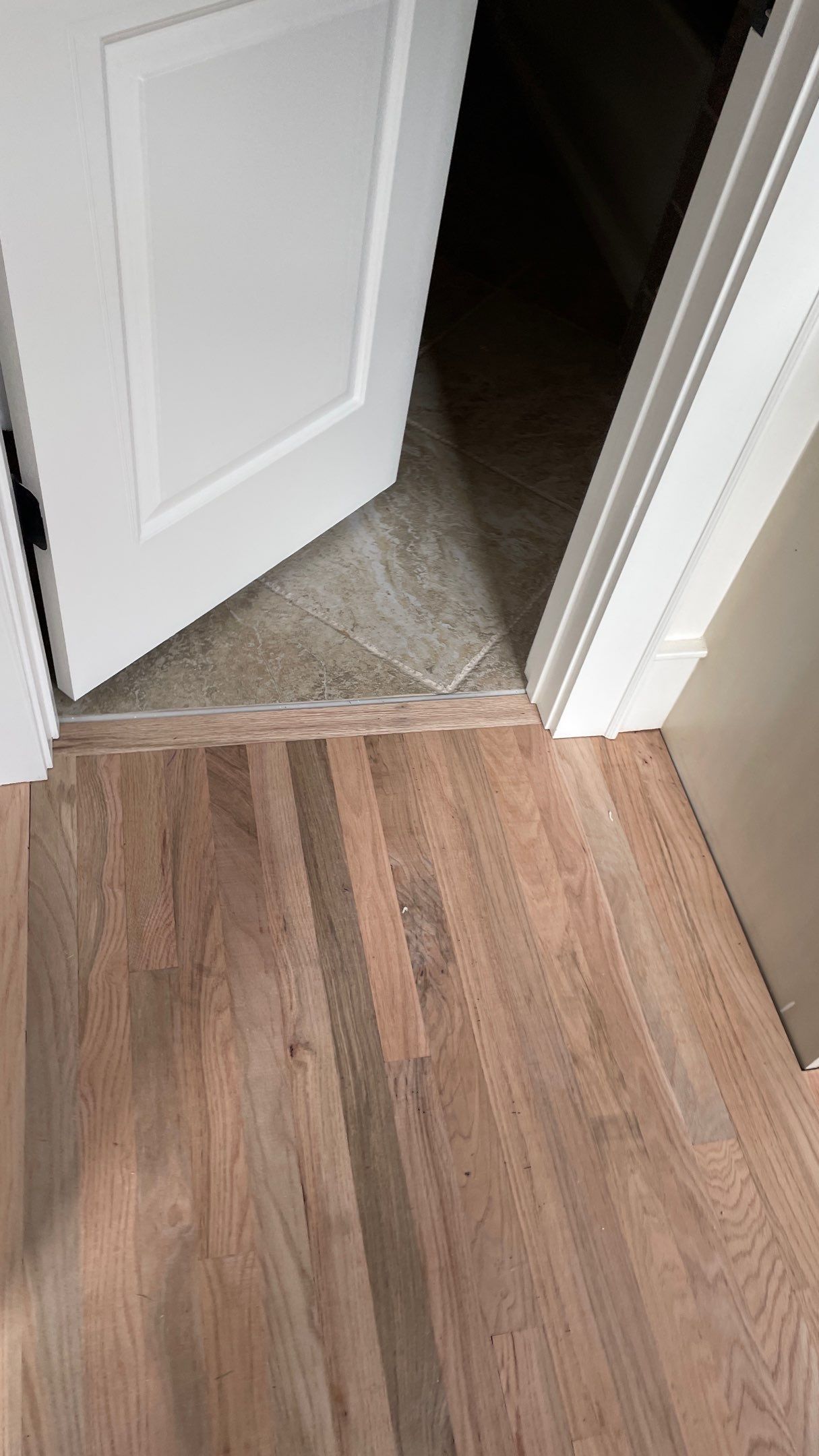 Herringbone Wood Hallway and Rooms by Footprints Floors of Coastal Carolina