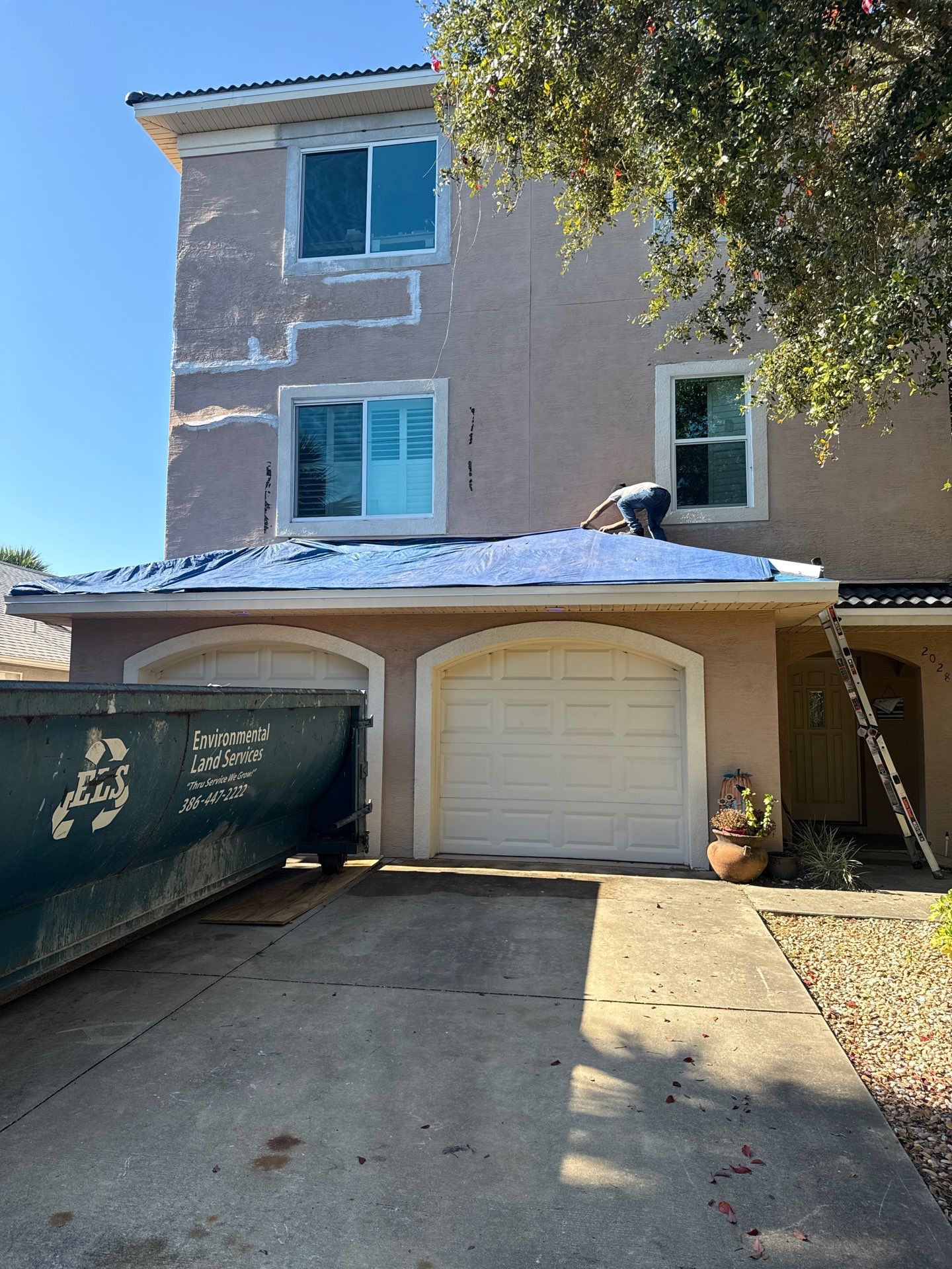 Flagler Beach Residential Tile Roof Replacement with Dark Barrel Tiles by Fortified Roofing Solutions Corp.