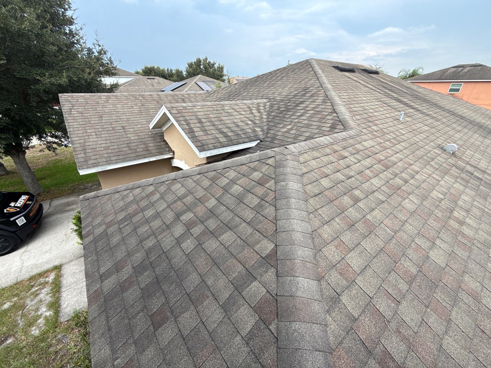 Residential Asphalt Shingle Roof Installation with Solar Ventilation in Davenport by JHI Roofing
