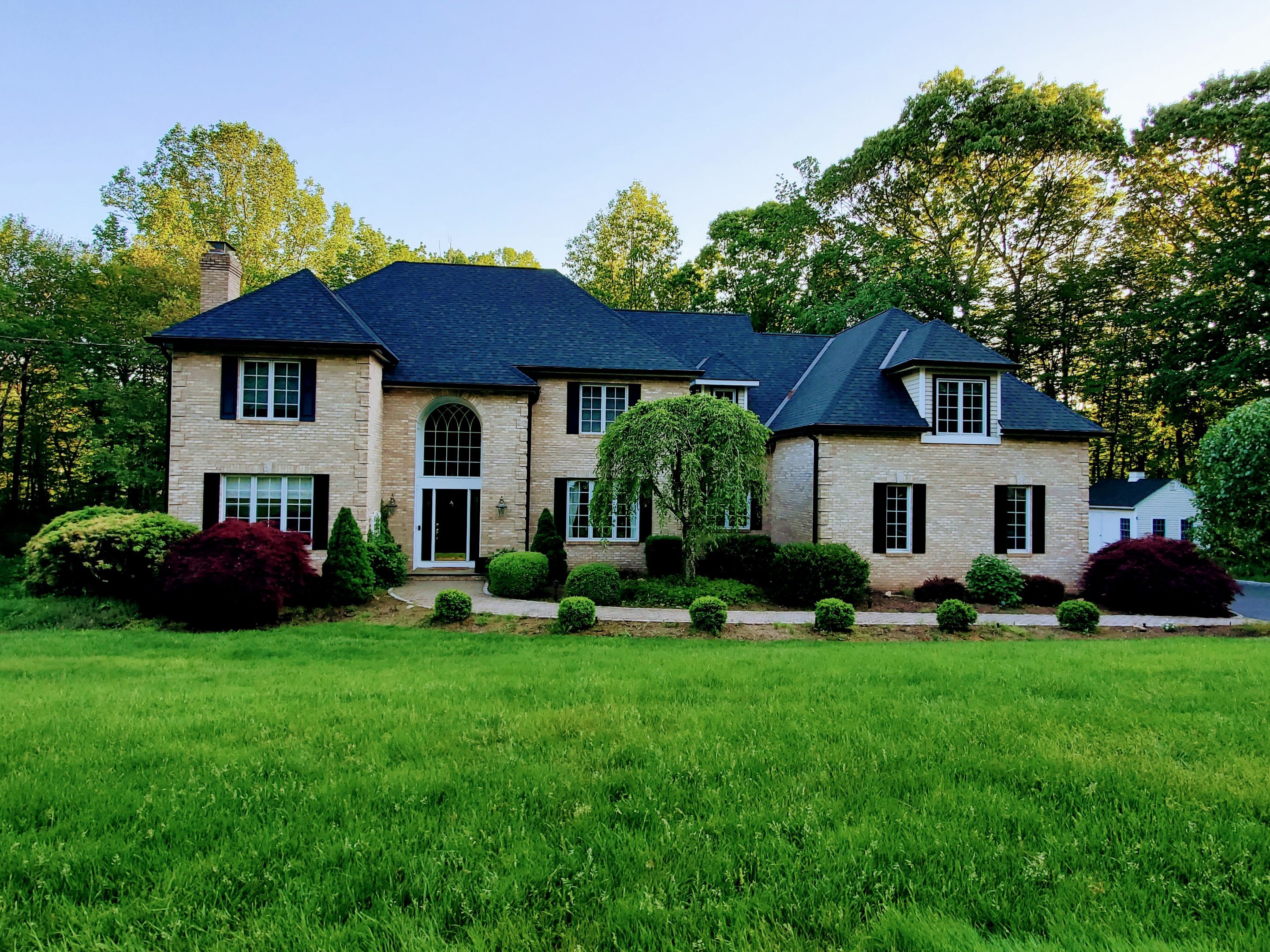 Residential Roofing Installation using Owens Corning TruDefinition Onyx Black by A Plus Exterior