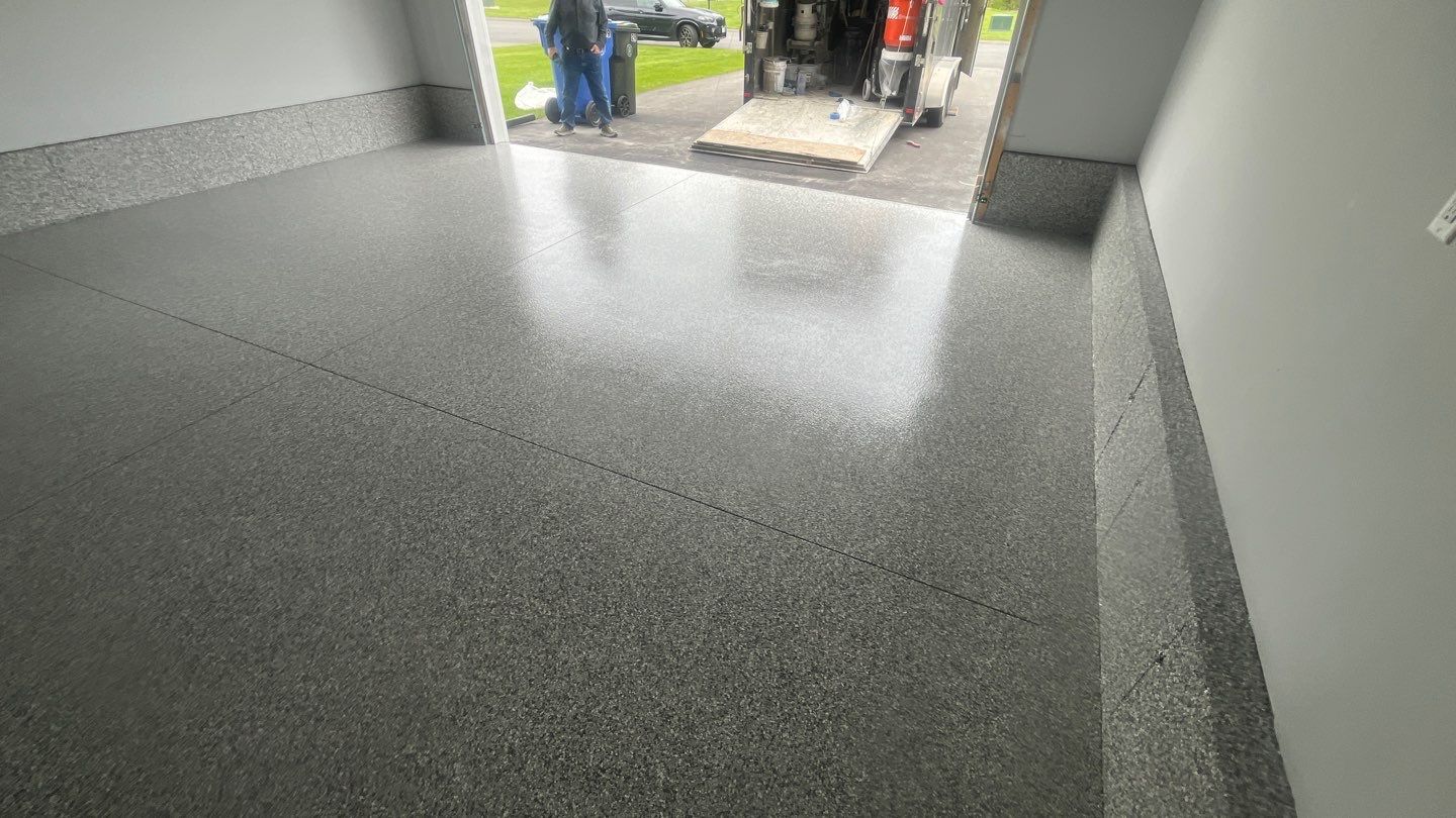 Garage in Londonderry, NH 03053 by Symphony Concrete Coatings