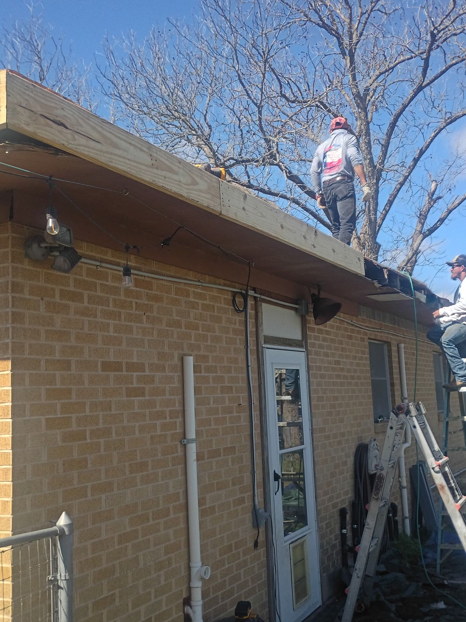 Torch down modified bitumen roof and full fascia "face-lift" in Elgin, TX by REPS Austin Area Roofer