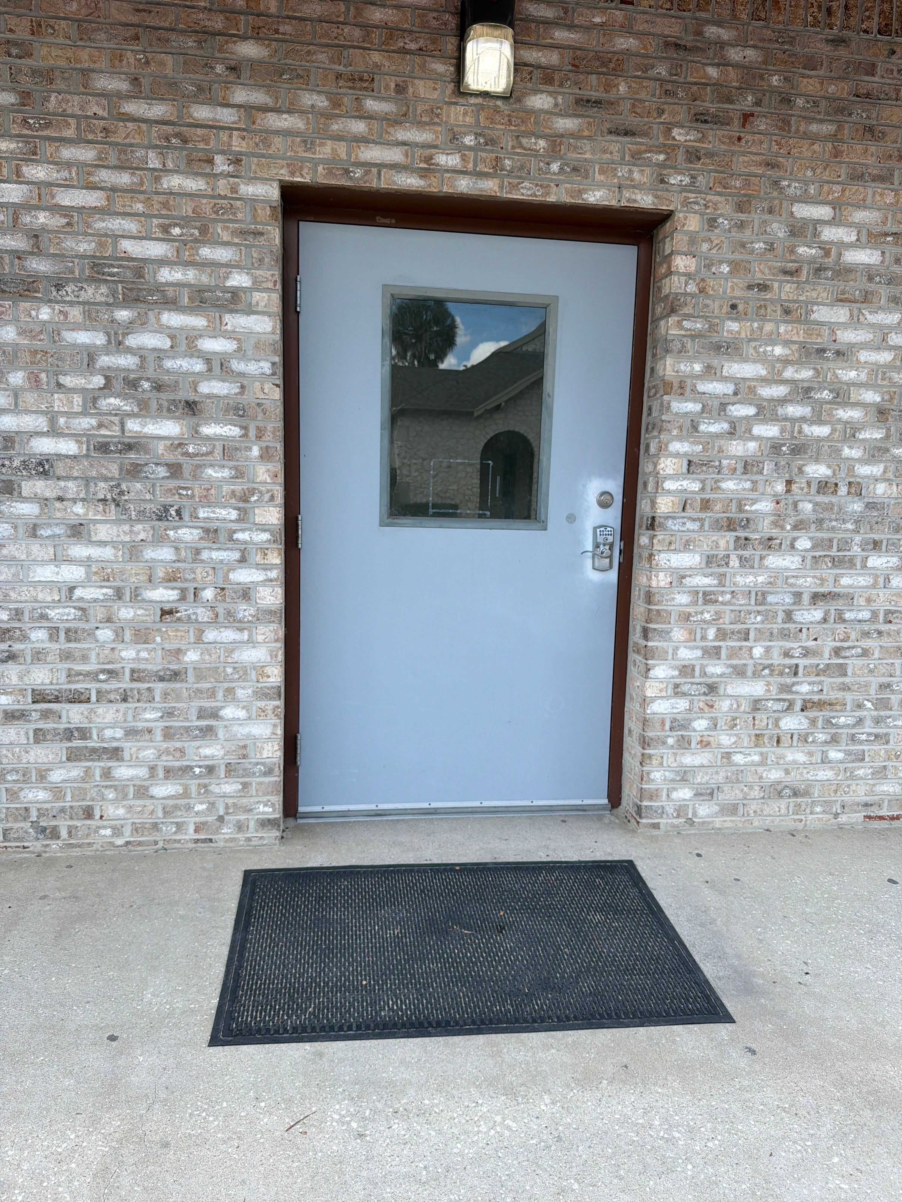 Commercial Entry Door Upgrade with ProVia Sidelight in Newberry by Windows & Doors Store